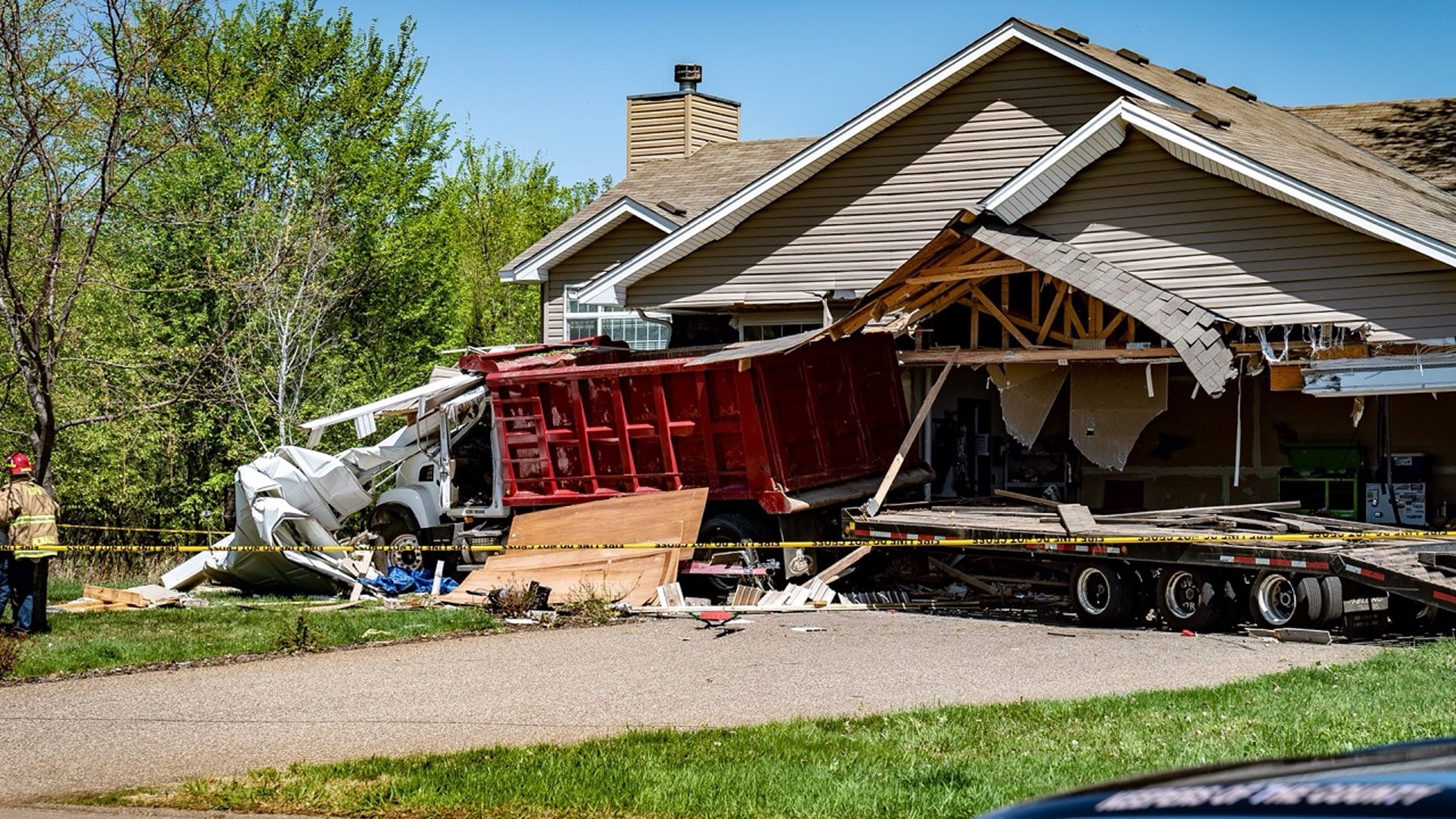 Dump truck crashes into Oak Grove home