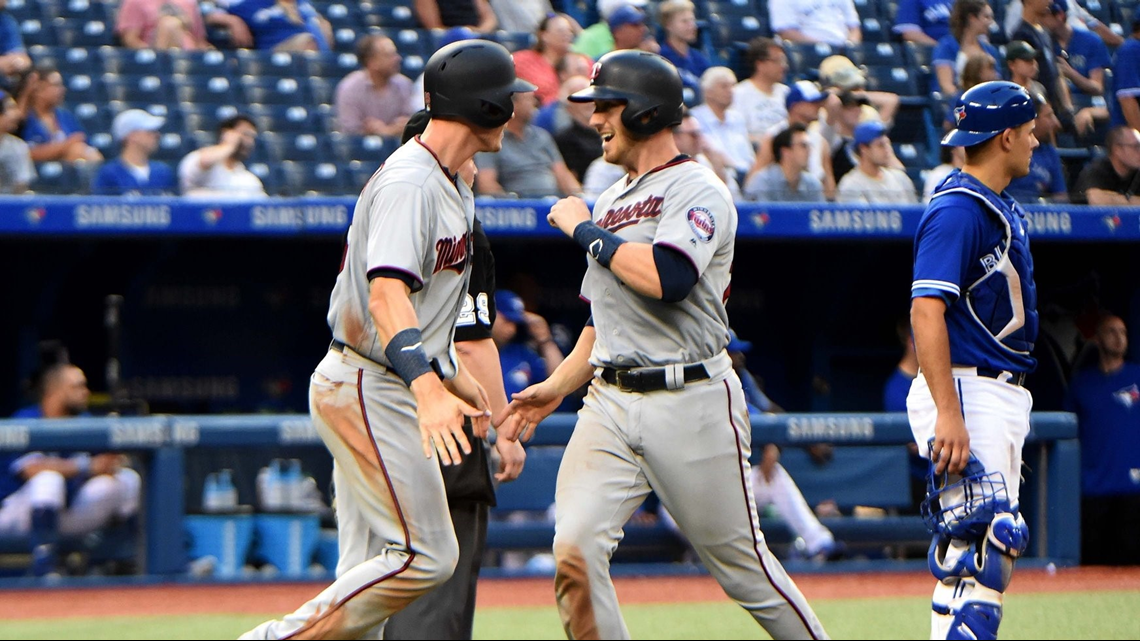 Twins use 6-run 11th to beat Blue Jays 12-6, complete sweep
