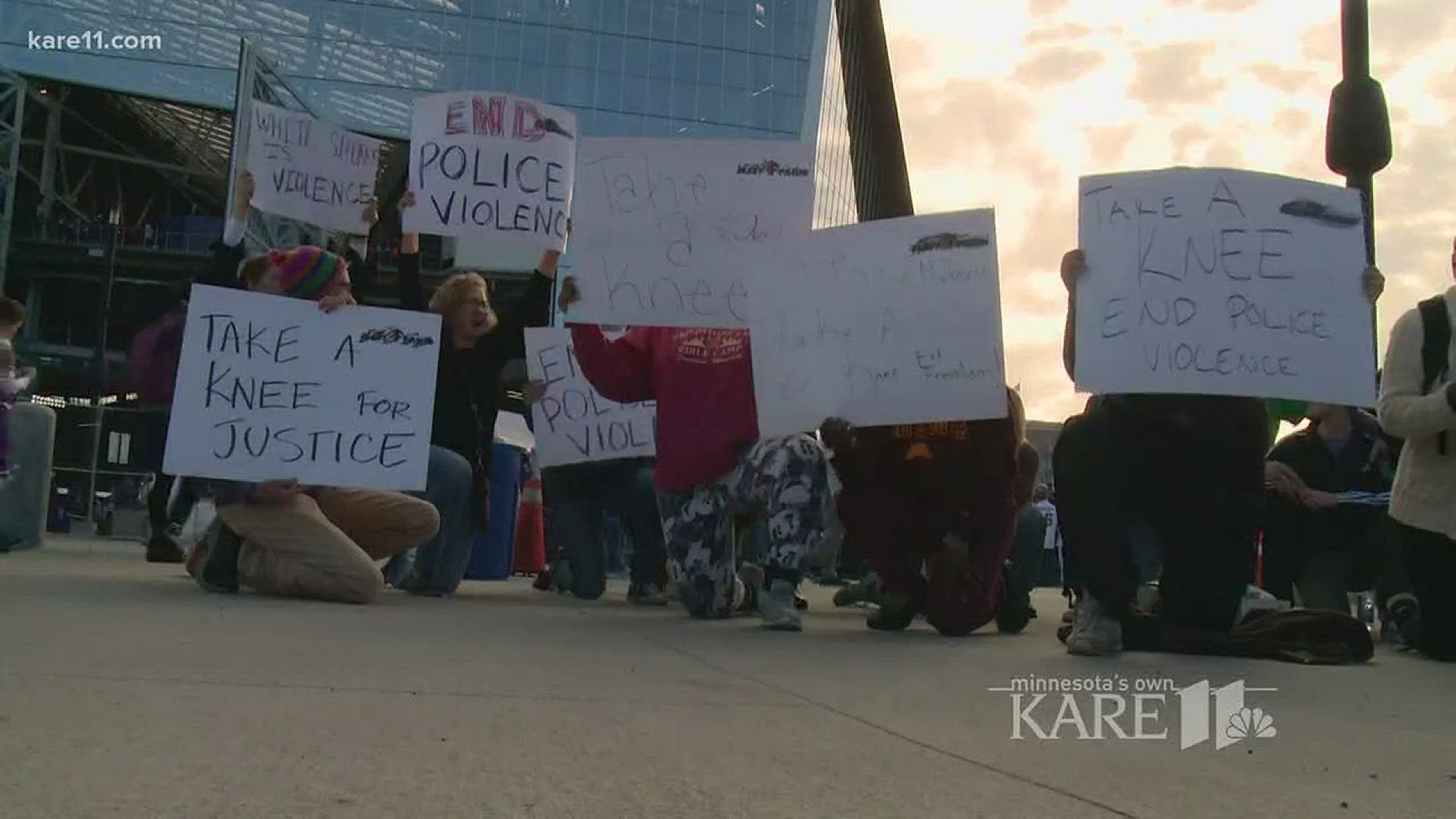 As Vikings fans tailgated ahead of Sunday's game against the Baltimore Ravens, about two dozen protesters were "taking a knee" outside U.S. Bank Stadium. http://kare11.tv/2zty6mk