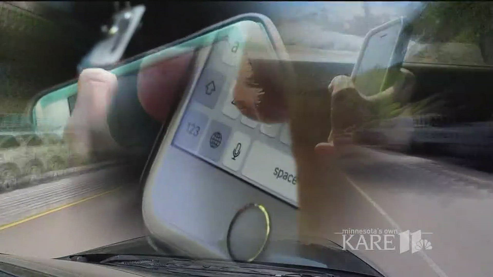 The Washington State law makes it illegal for a driver to hold an electronic device in even when stopped at an intersection or in traffic, which closes loopholes in other state laws. http://kare11.tv/2uT3mfg