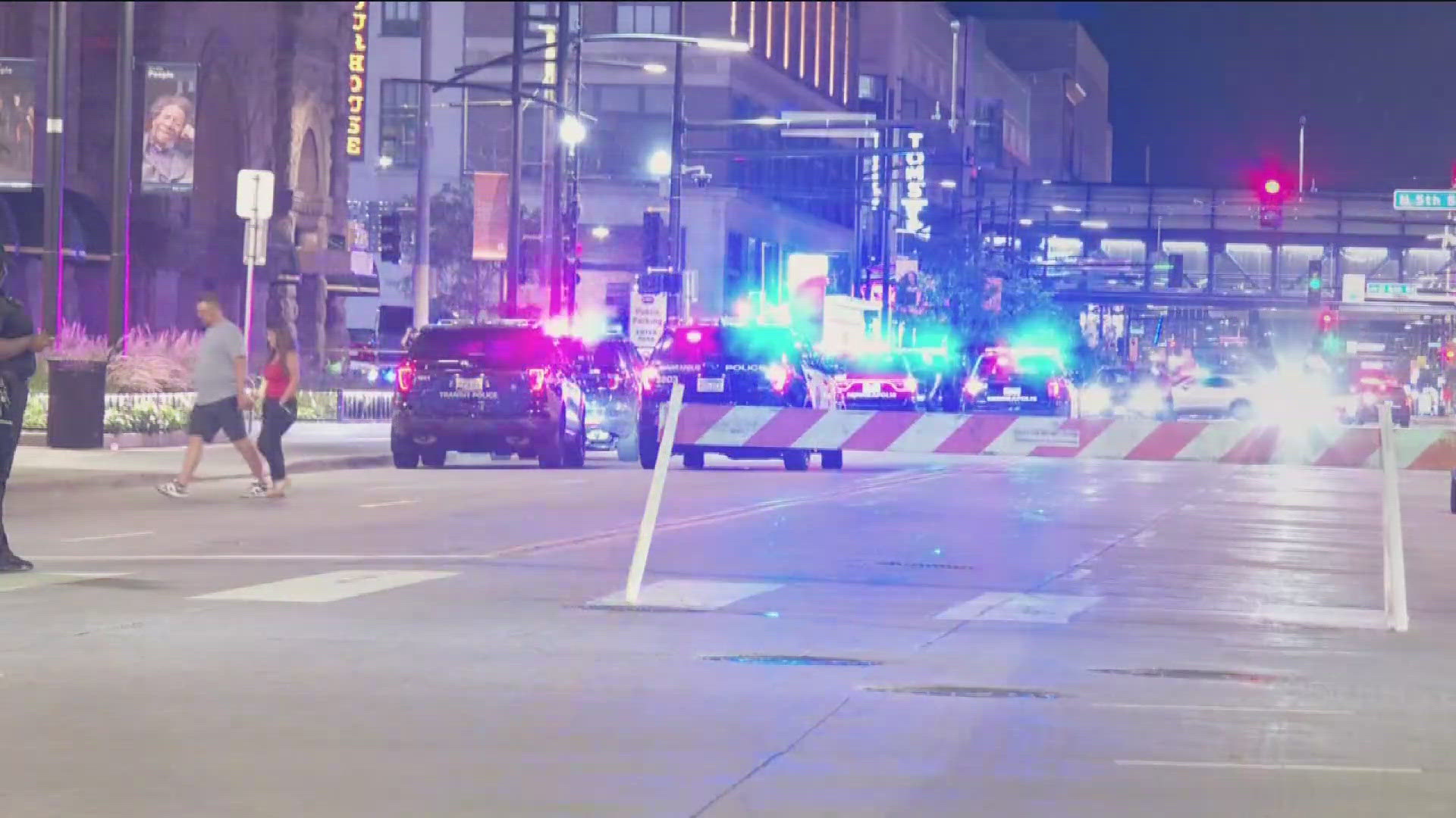 Police said a woman drove into a crowd after an altercation in downtown Minneapolis early on Saturday morning.