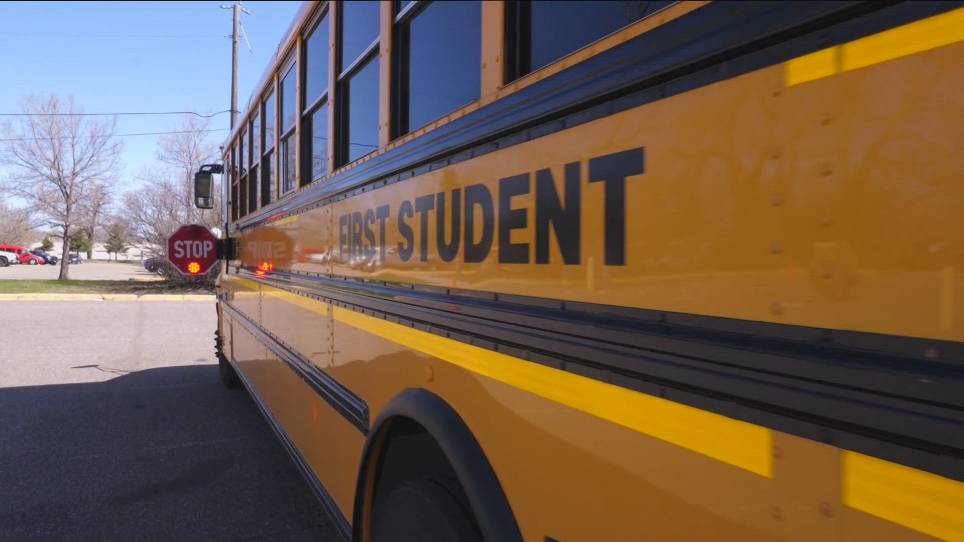 Officials are reminding drivers that they must put on their brakes  for school buses when their stop signs are out.