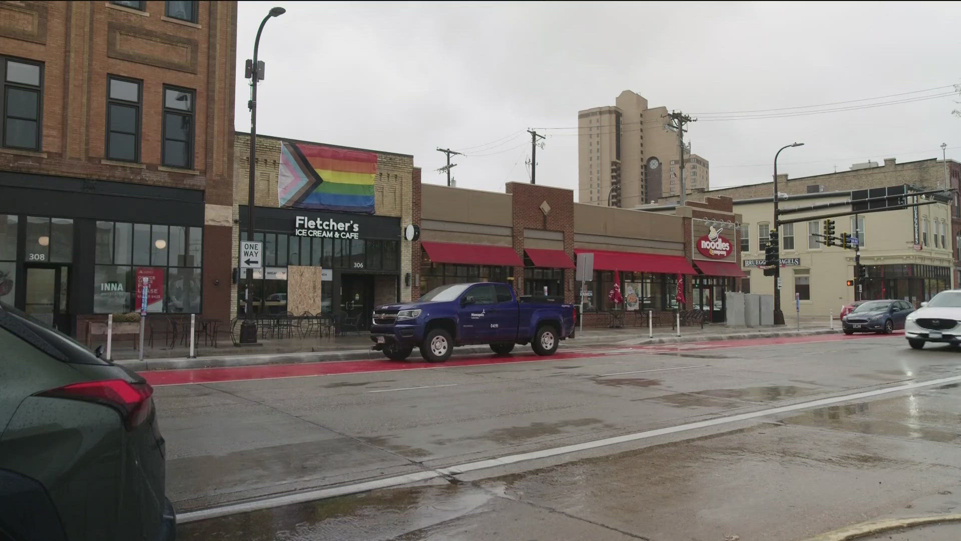 A Minneapolis business is recovering from damage after a man allegedly threw firebombs through the window both Sunday and Monday. 