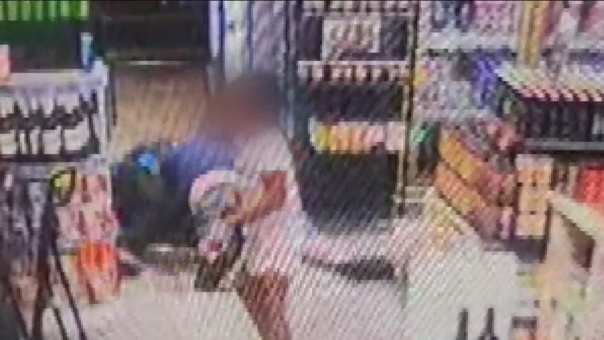 Surveillance tape from a liquor store in Maplewood shows the child striking the suspect several times as he struggled with the girl's father over a gun.