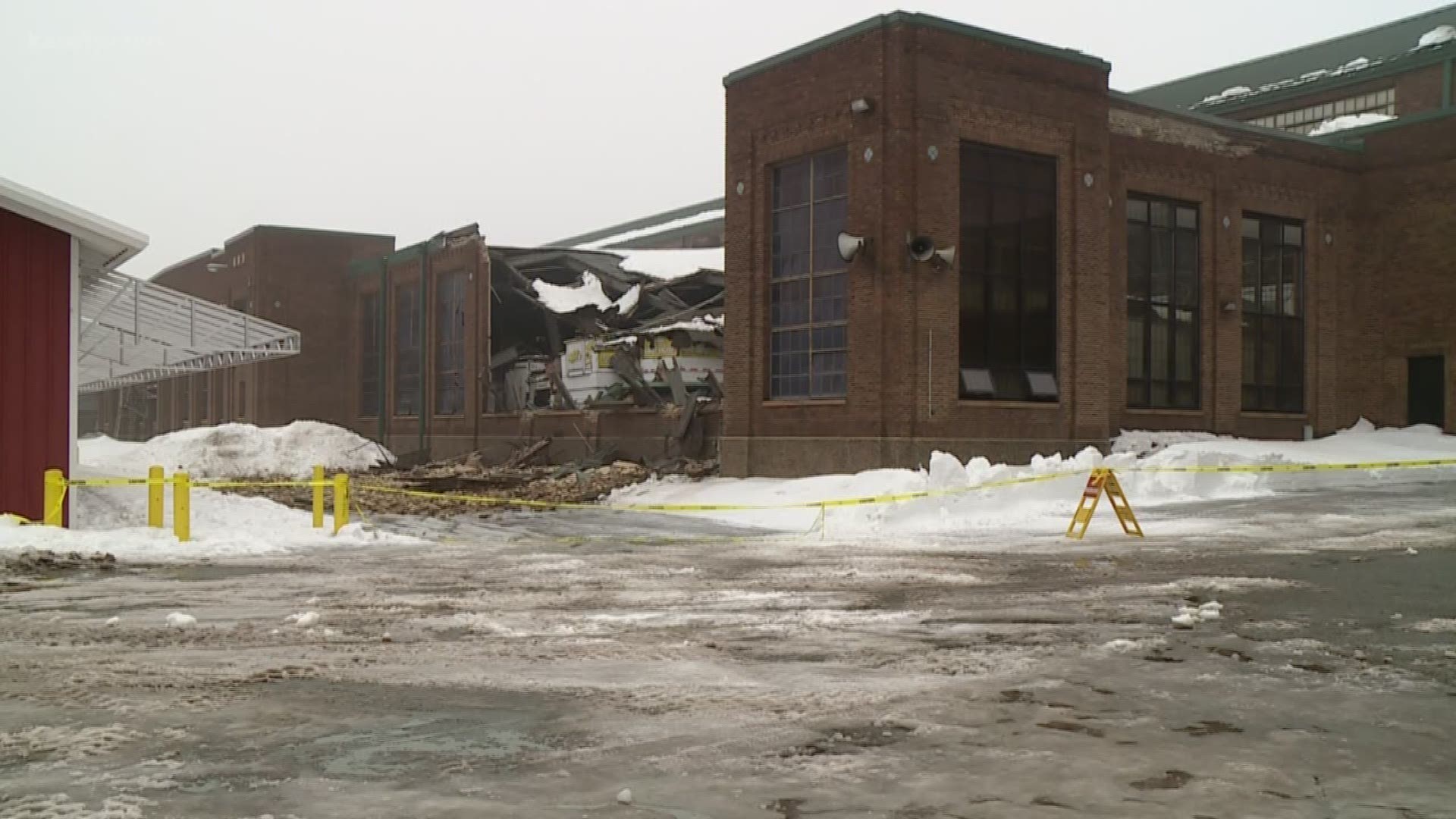 Thousands of pounds of snow came crashing down Tuesday due to a unique roofing design at Cattle Barn.