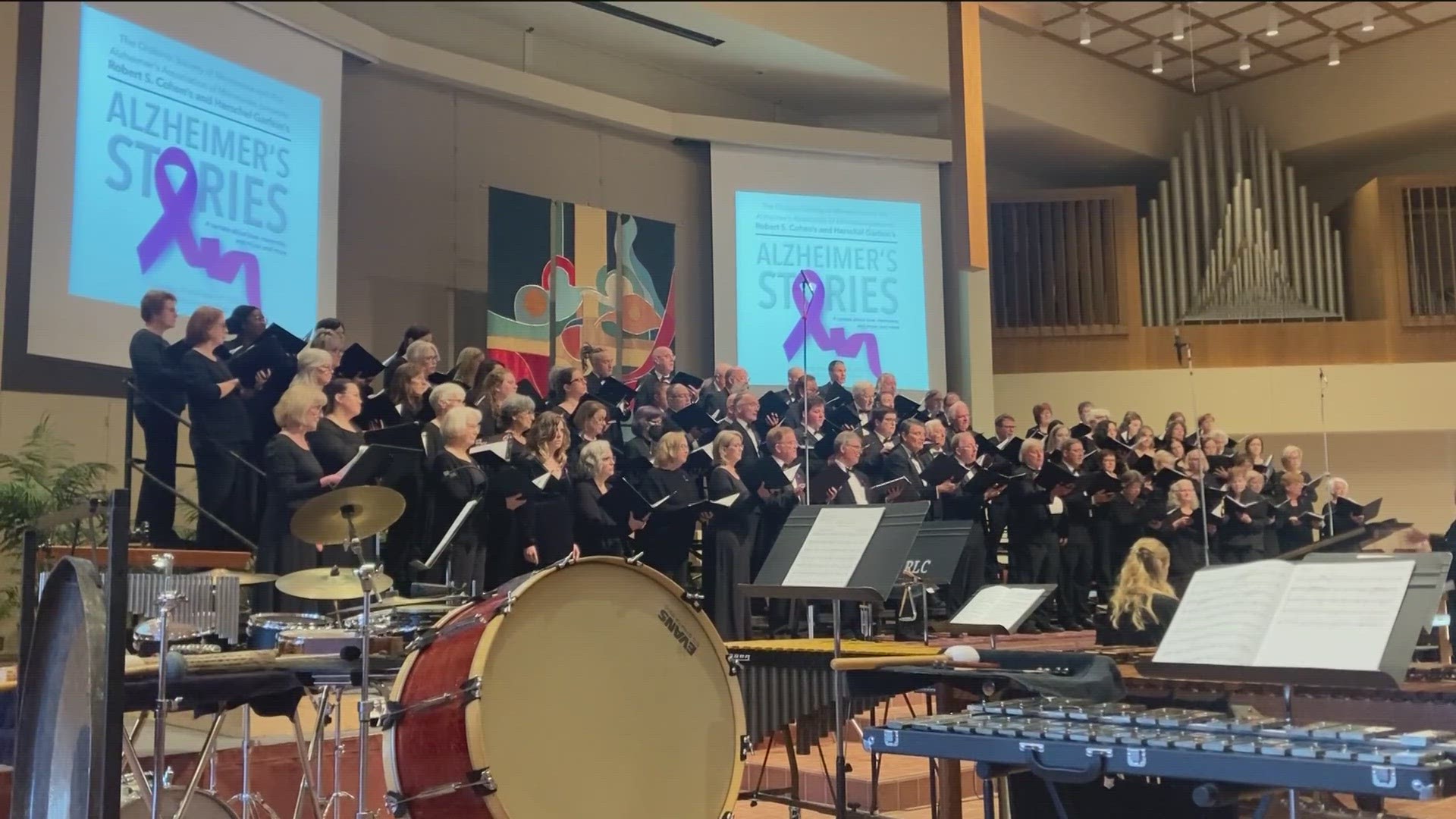 A 90-member chorus performed songs written to capture the challenges of living with or losing someone to dementia.