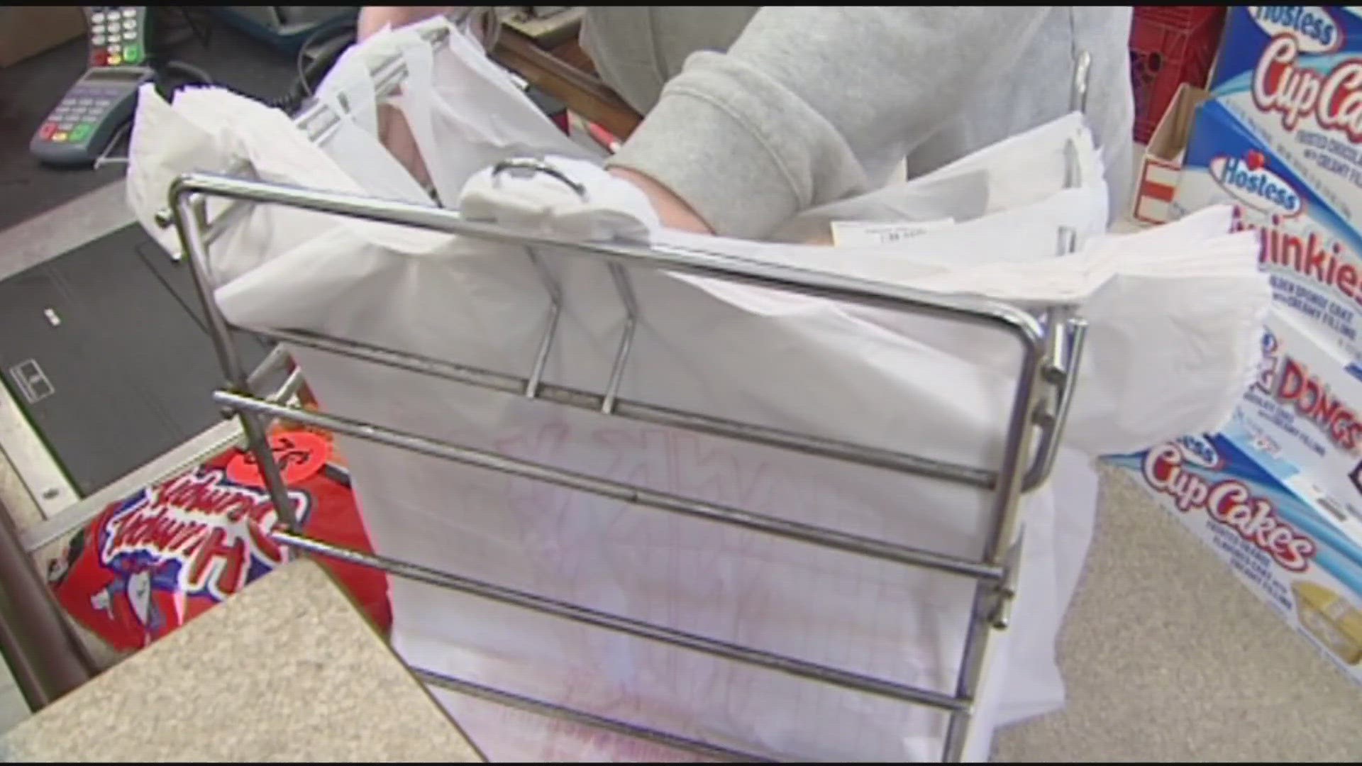 State lawmakers debated a new bill Tuesday that would allow individual cities and towns to ban plastic bags.