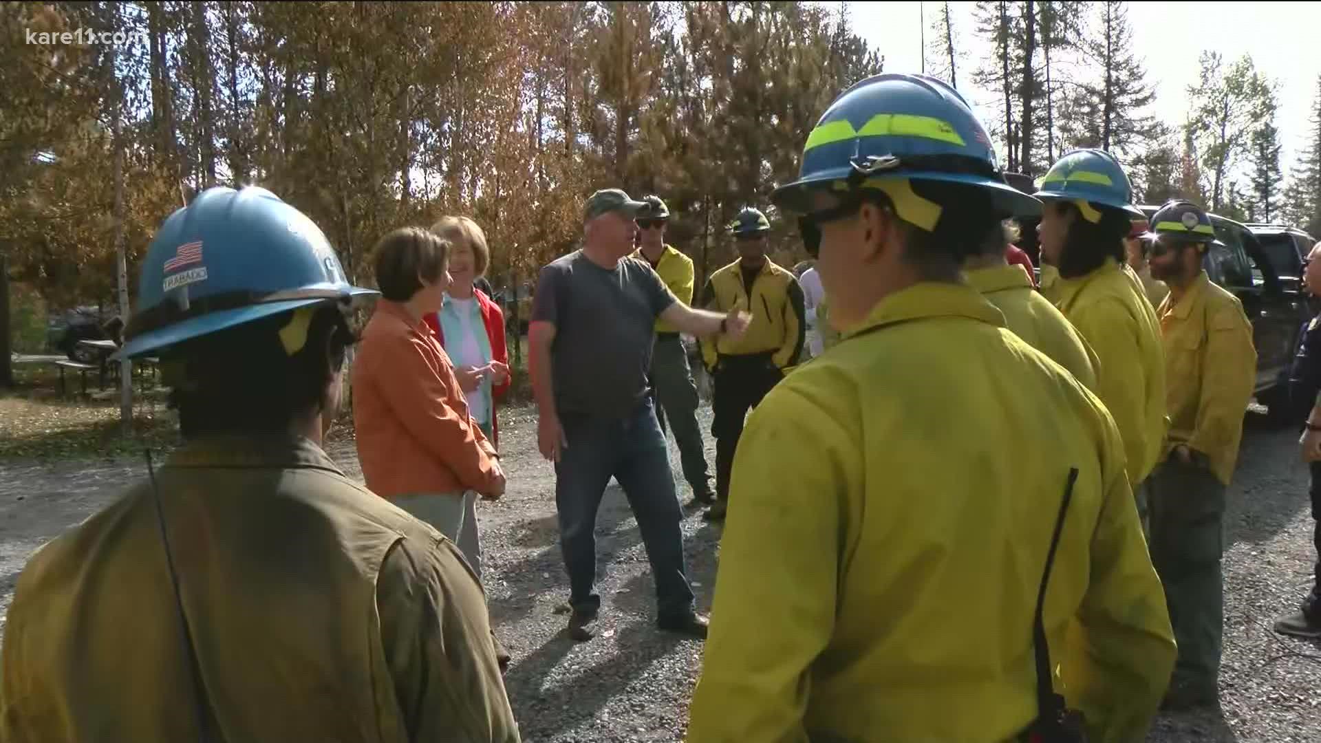 The fire is still 37% contained and covers nearly 41 square miles. Officials said better weather helped crews "greatly diminish" the threat to cabins and homes.