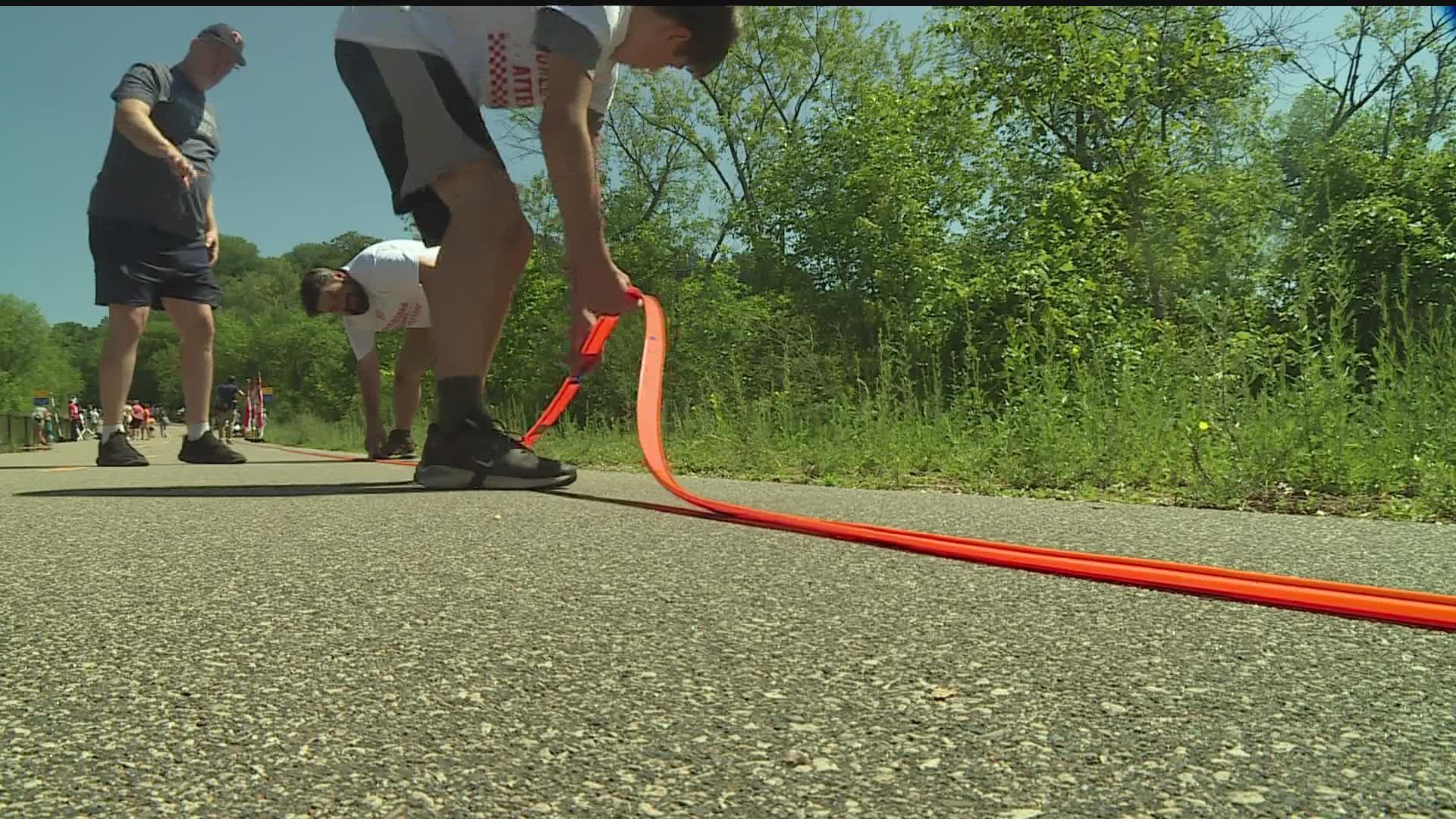 Boy Scouts are trying to build the longest Hot Wheels track from Houlton, Wisconsin to the historic Stillwater Lift Bridge.