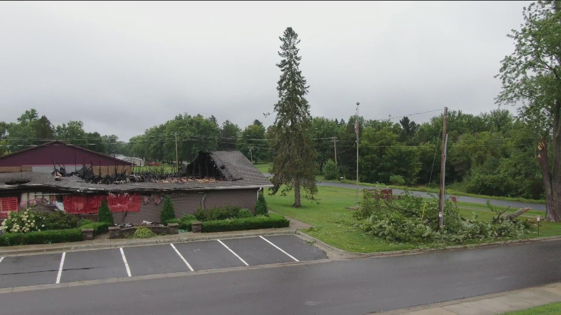 Investigators are looking into whether storms knocked a tree into a power line Monday night in Milltown, Wisconsin.