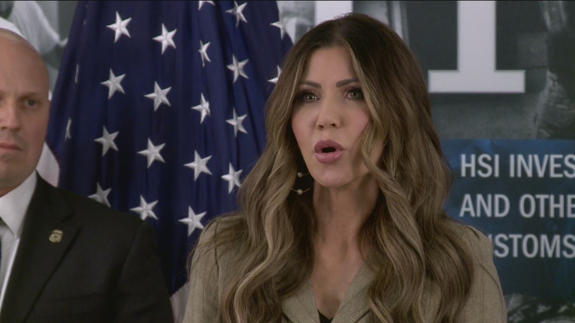 The secretary was speaking in front of four mugshots, which allegedly represented undocumented immigrants accused of various crimes who were deported from Minnesota.
