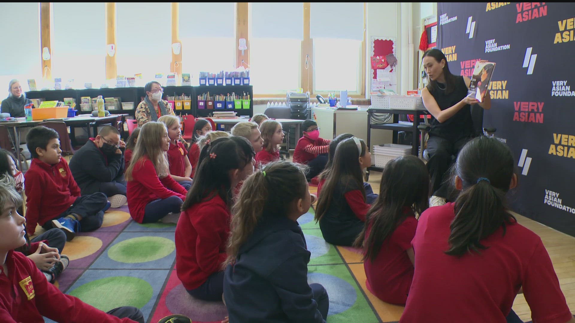 Former KARE 11 Anchor Gia Vang and Michelle Li, co-founders of The Very Asian Foundation, visited two St. Paul schools to donate books by AANHPI authors.