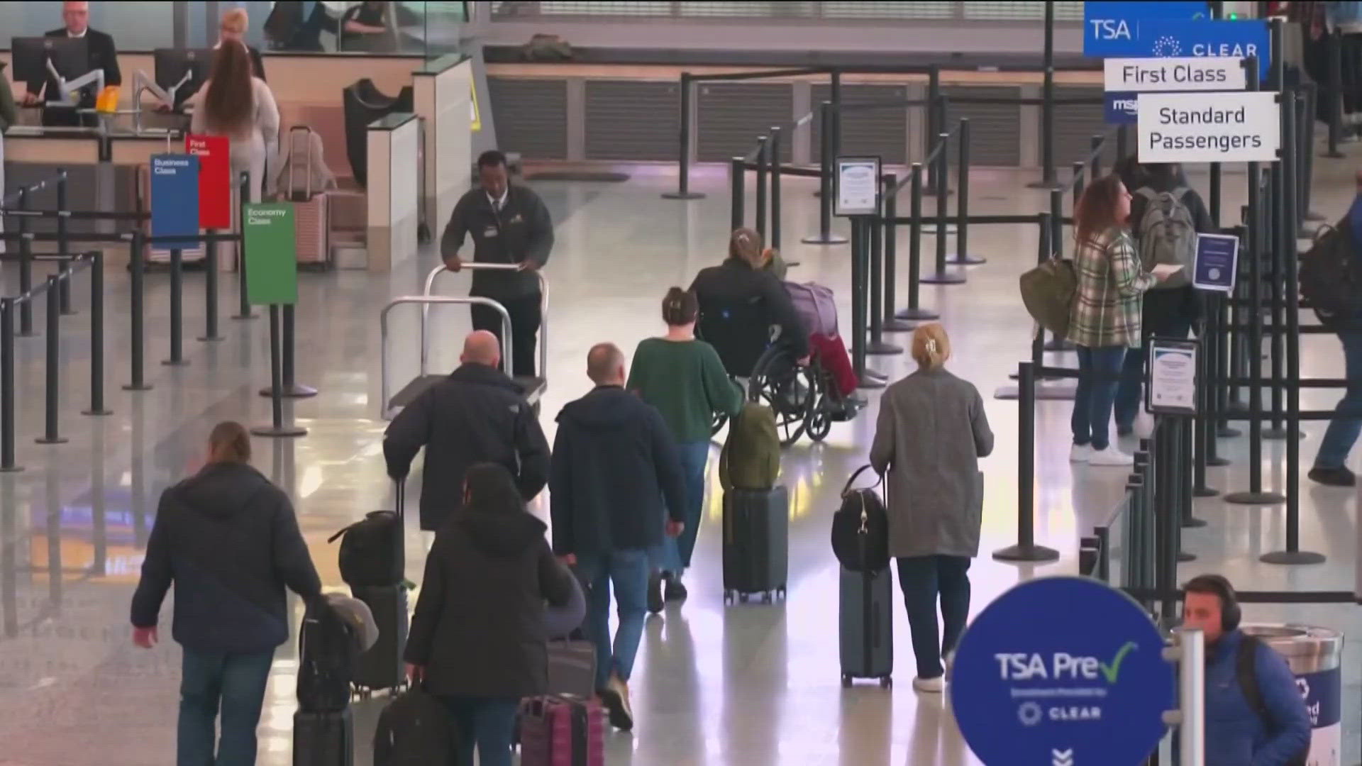 MSP Airport is bustling on Tuesday as residents head to warmer places or to visit family.