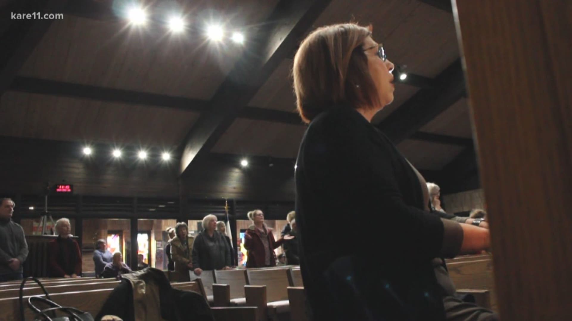 After their church burned down last week in Norwood Young America, members of the Church In The Maples congregation joined the service at Arlington United Methodist Church.