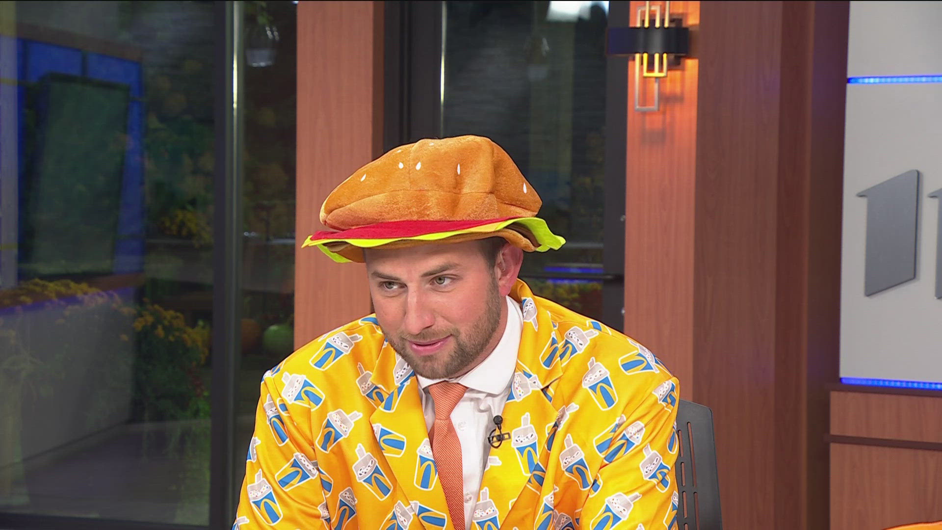 KARE 11 Sunrise anchor Jason Hackett is the elephant in the room and meteorologist John Zeigler is a McDonald's burger. 