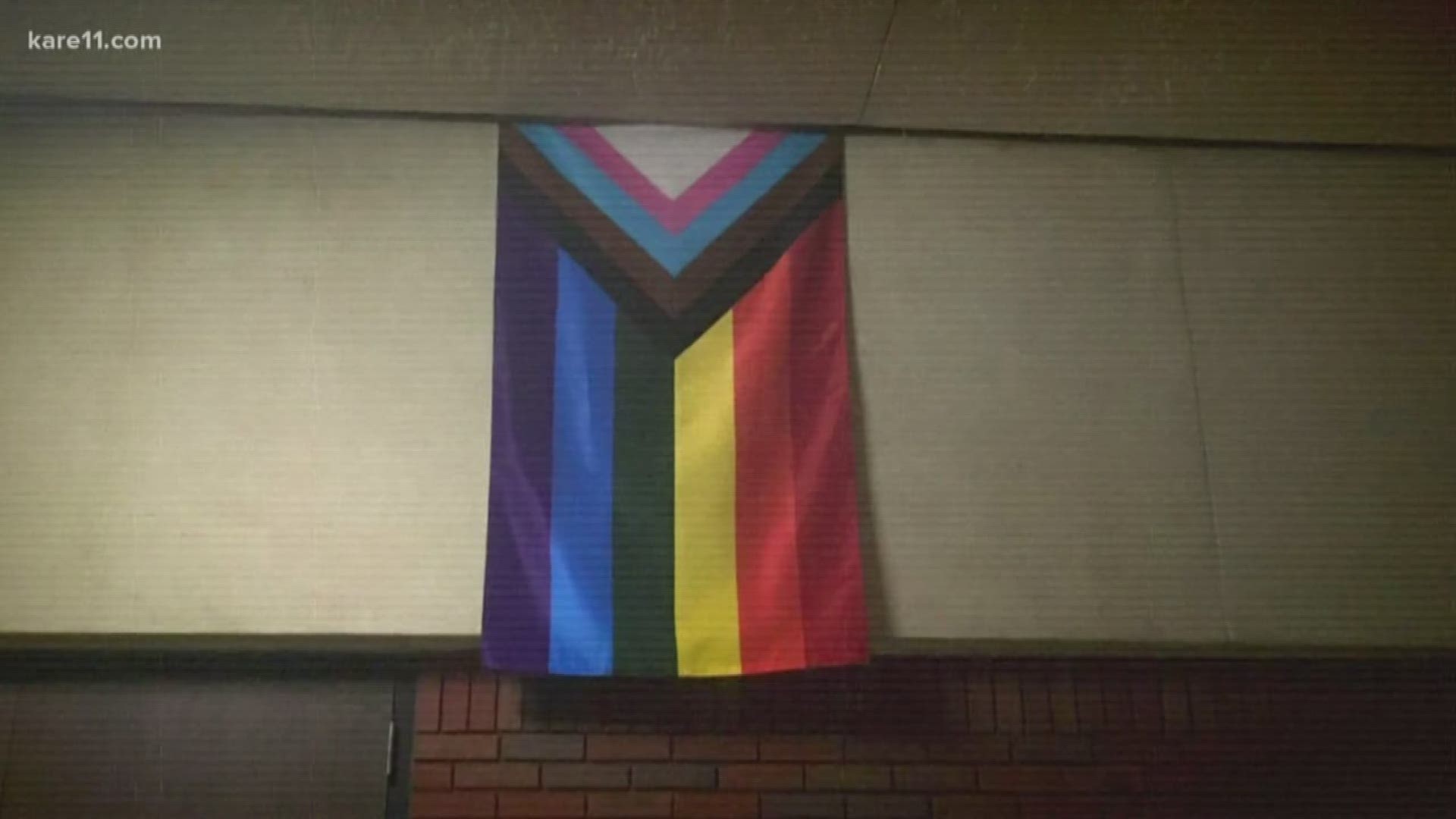 A display featuring a rainbow pride flag in the cafeteria at Marshall Middle School led to a lengthy community discussion at a school board meeting