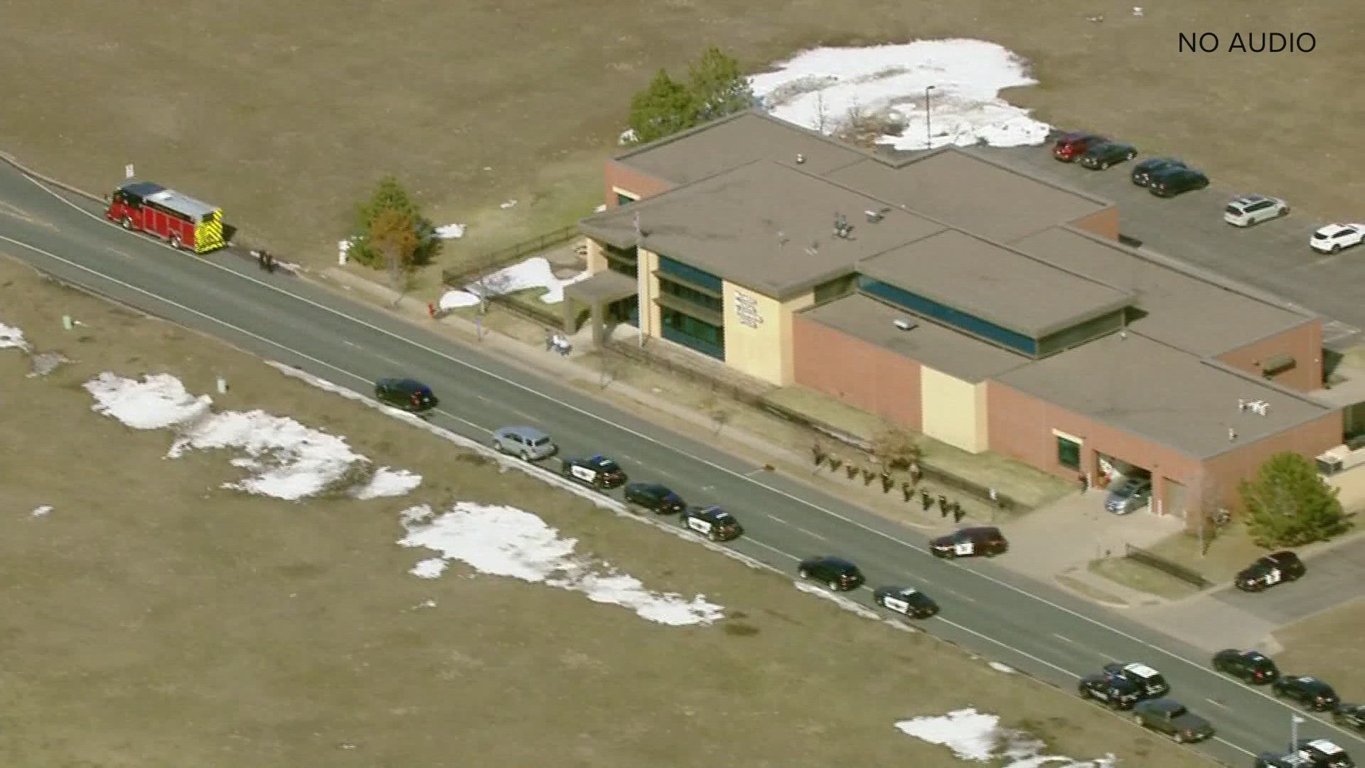 Law enforcement vehicles escorted fallen officers Emily Breidenbach and Hunter Scheel back to Wisconsin Monday after their autopsies were performed in Ramsey.