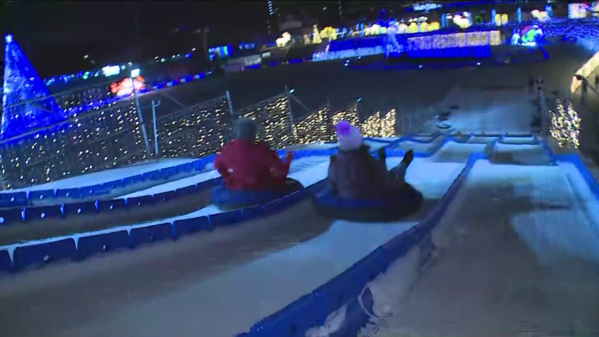 KARE 11's Michelle Baik totally immersed herself in the GLOW experience, from ziplining to a run down the giant slide.