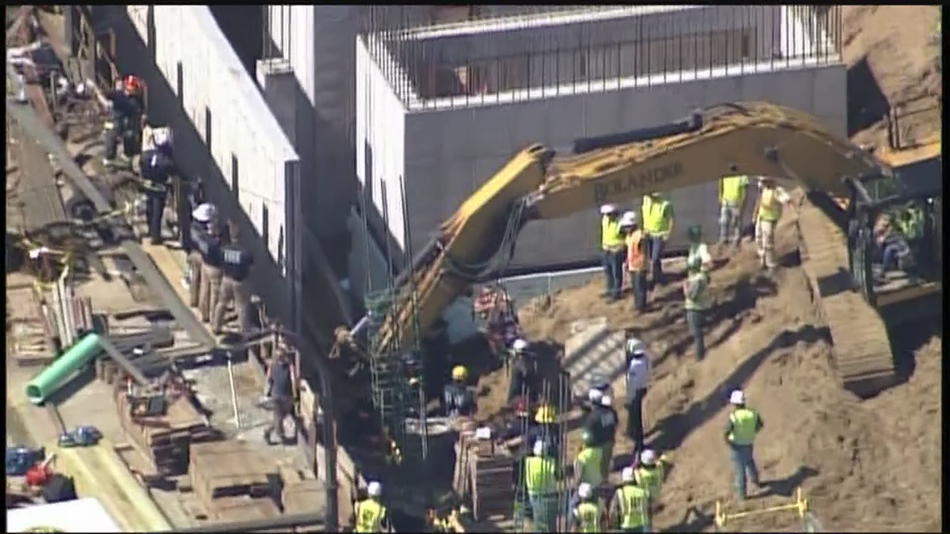 A worker was trapped for more than two and a half hours Monday after a trench he was working in collapsed in downtown Minneapolis Monday.