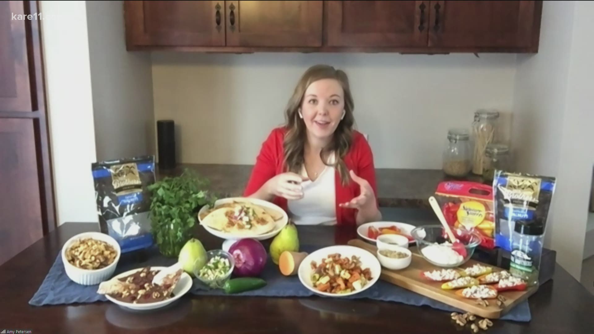 Amy Petersen, supermarket registered dietician at Coborn's, shows us a heart-healthy snack with peppers, cottage cheese and walnuts.