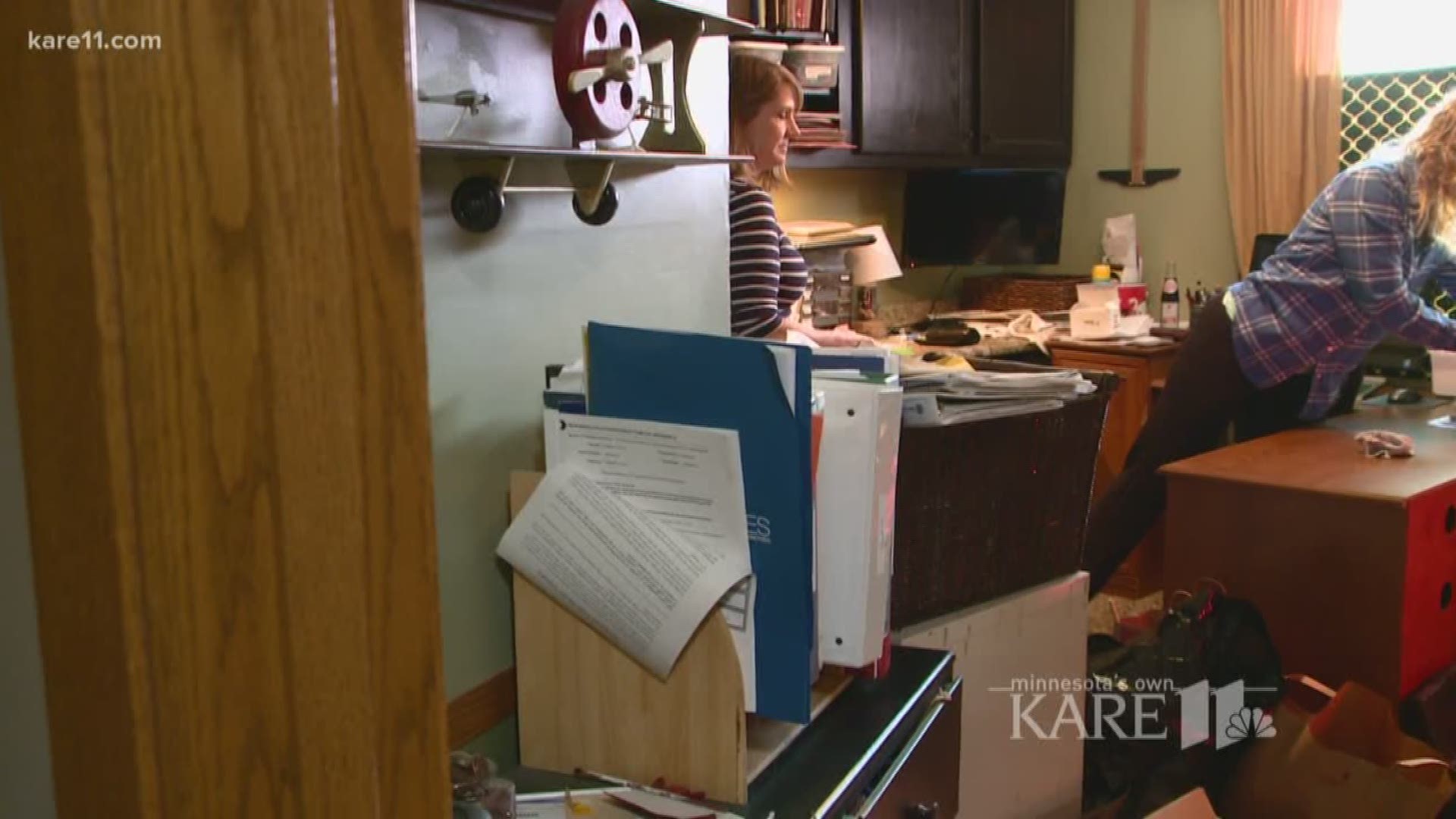 Decluttering expert Laurie Wrobel helps get rid of the clutter and piled up papers and stuff in a home office.