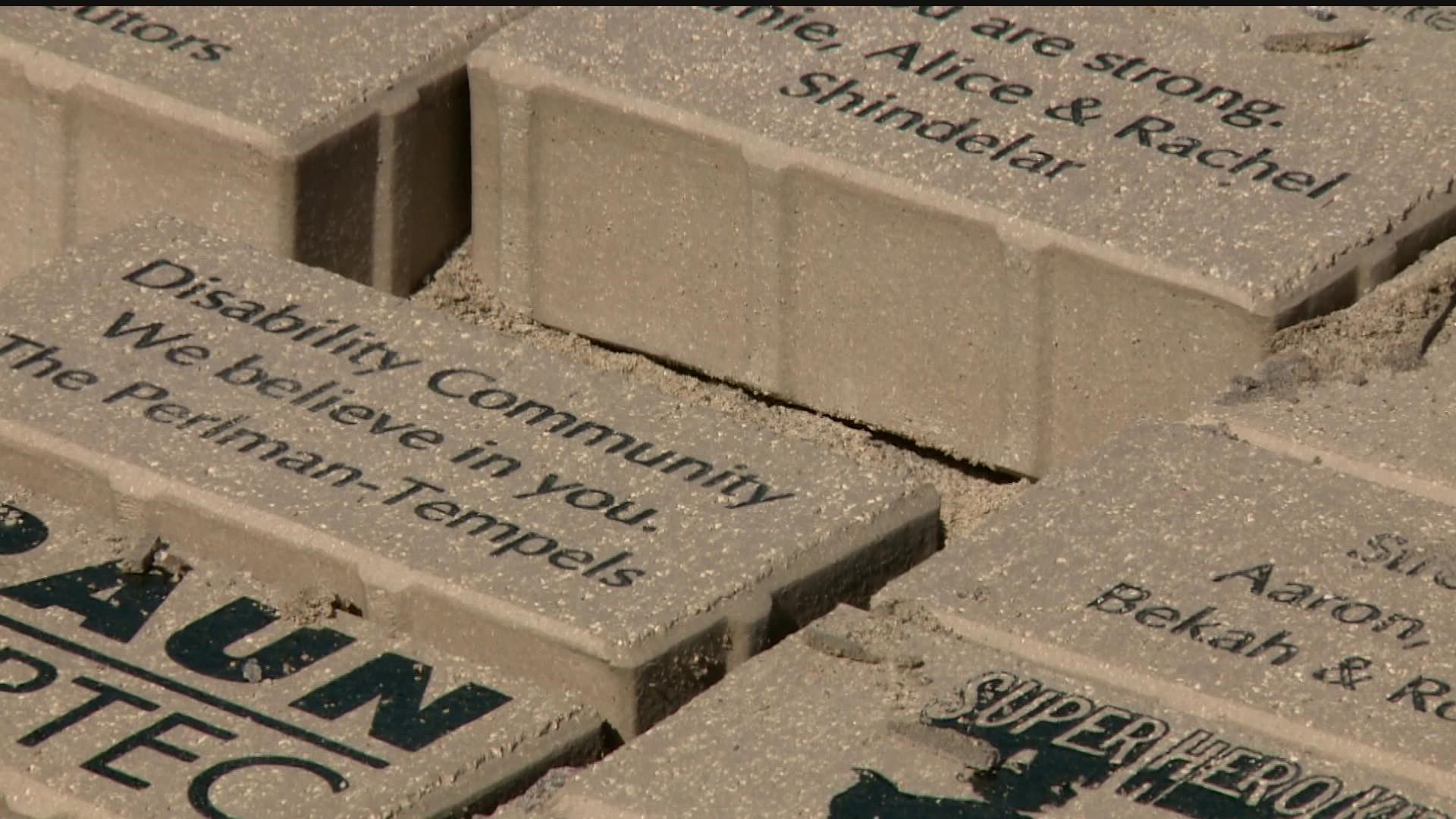 The Survivors Memorial, located in Boom Island Park in Minneapolis, has significant damage to its mosaics, donor recognition bricks and granite panels.
