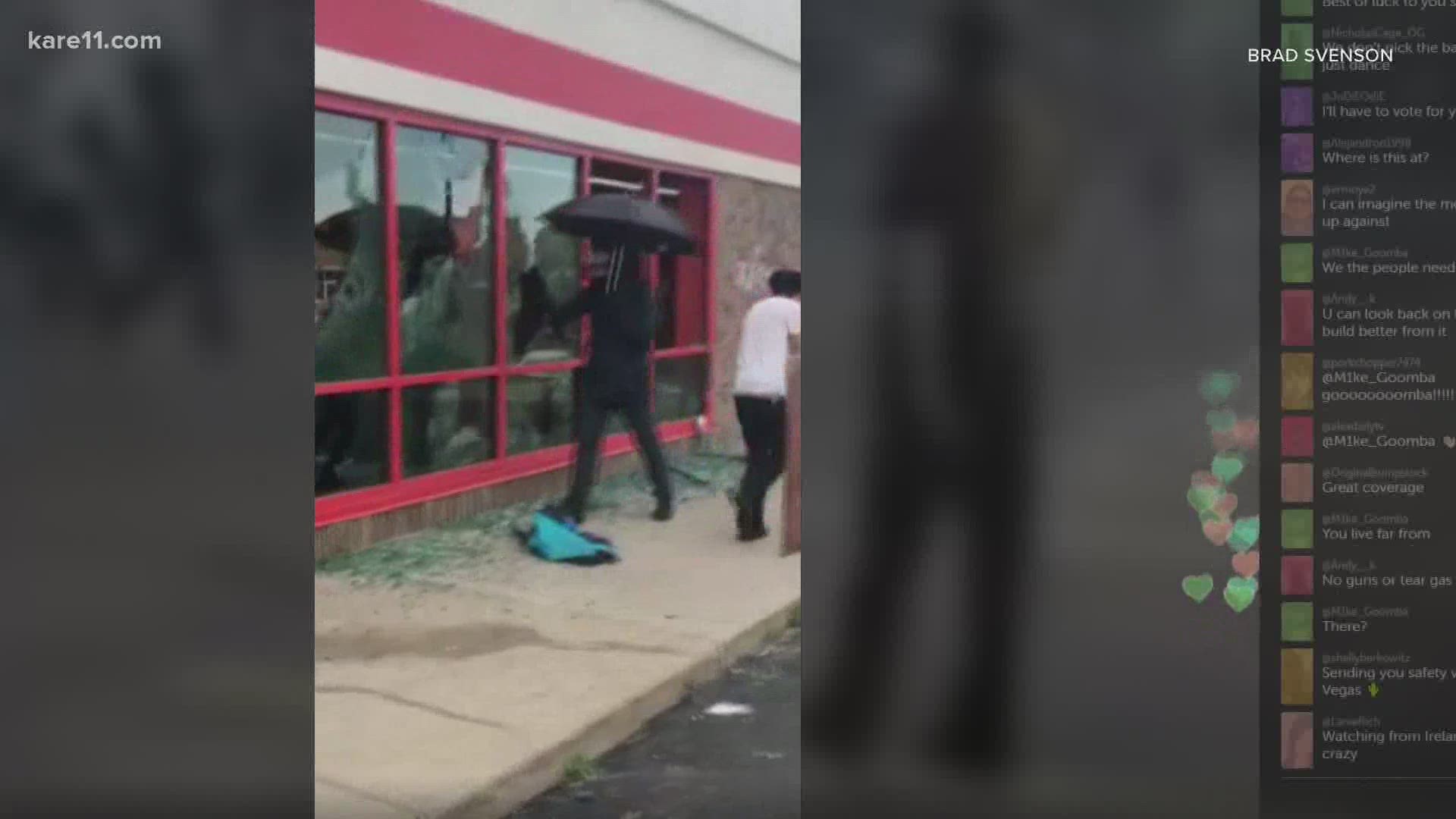 On the evening of May 27, 2020, a man dressed in all black, carrying an umbrella and a sledgehammer is seen on video walking to an Auto Zone and smashing the windows