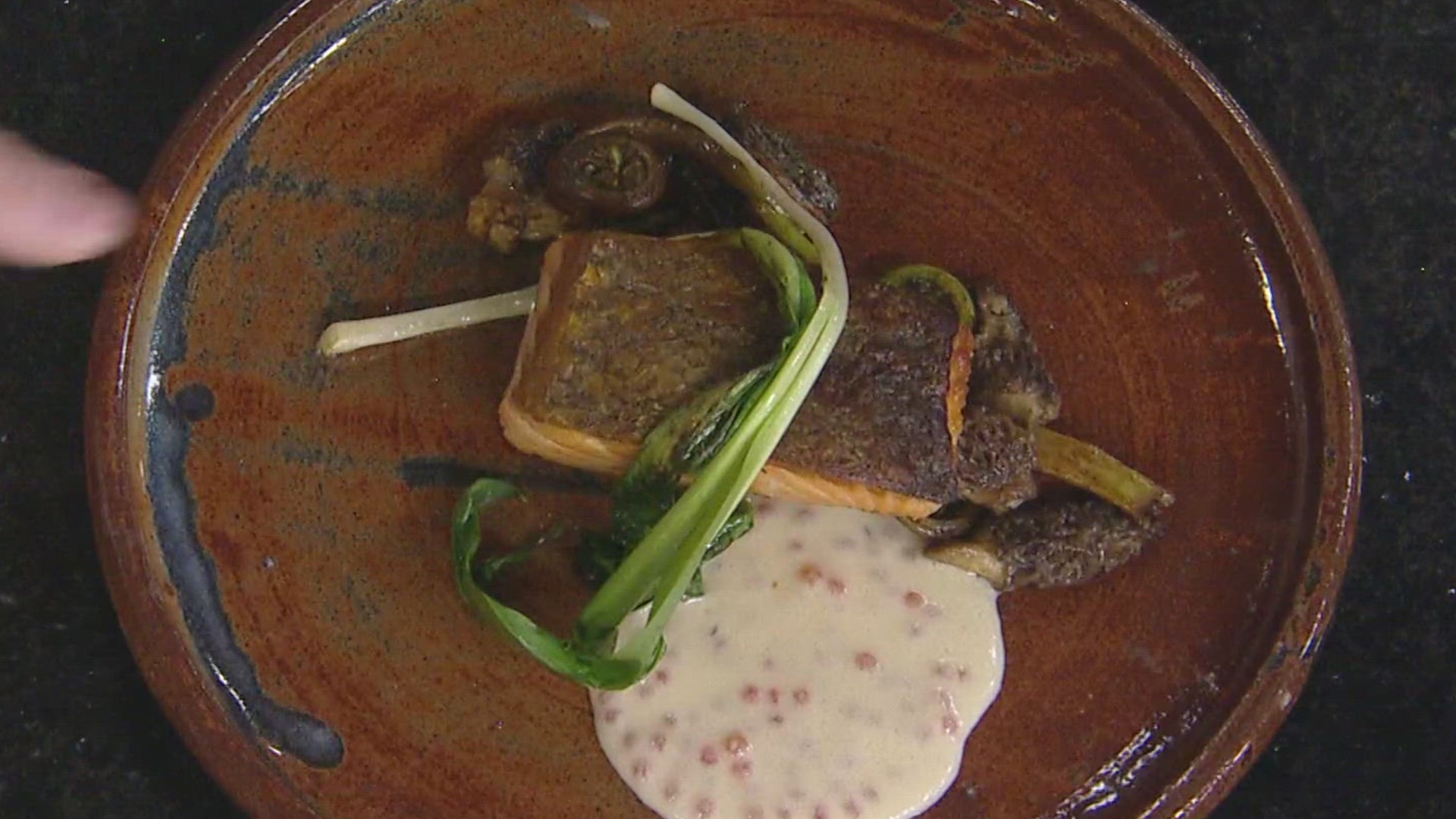 Chef Marque Collins joined KARE 11 Saturday with a Norwegian salmon dish with fiddlehead ferns, morels, ramps, smoked trout roe and aquavit beurre blanc.