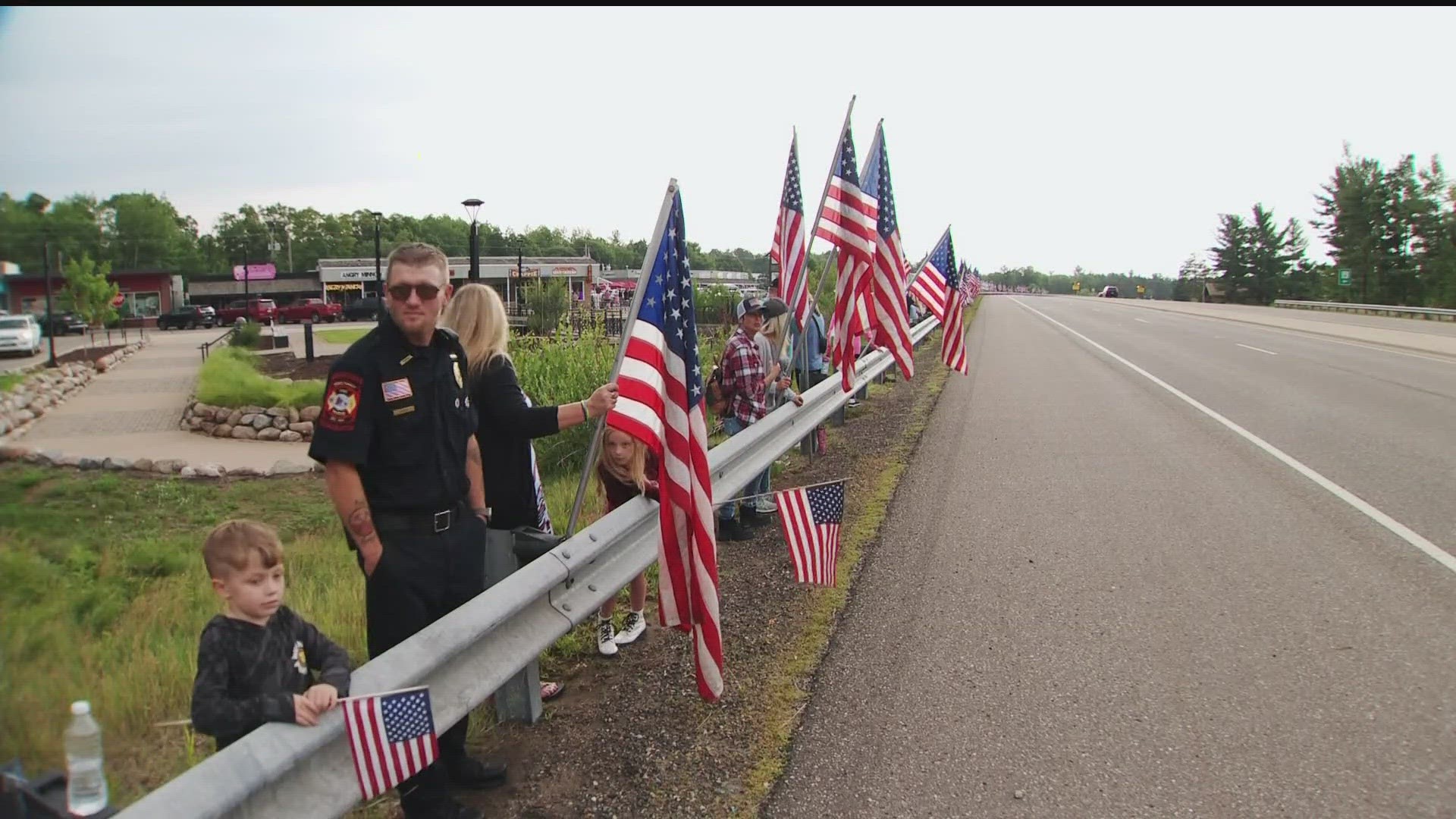 Crowds lined Highway 371 for miles to show their support for the family of the fallen officer.