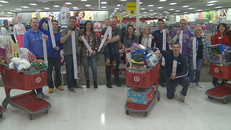 Fantasy football league fills 32 carts for Toys for Tots