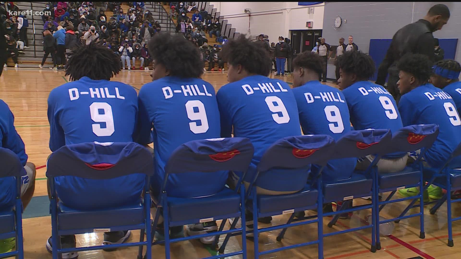 Hill's teammates wore warmup jerseys with his No. 9 on them, and his family was welcomed into the gym with a standing ovation as the crowd chanted "D-Hill."