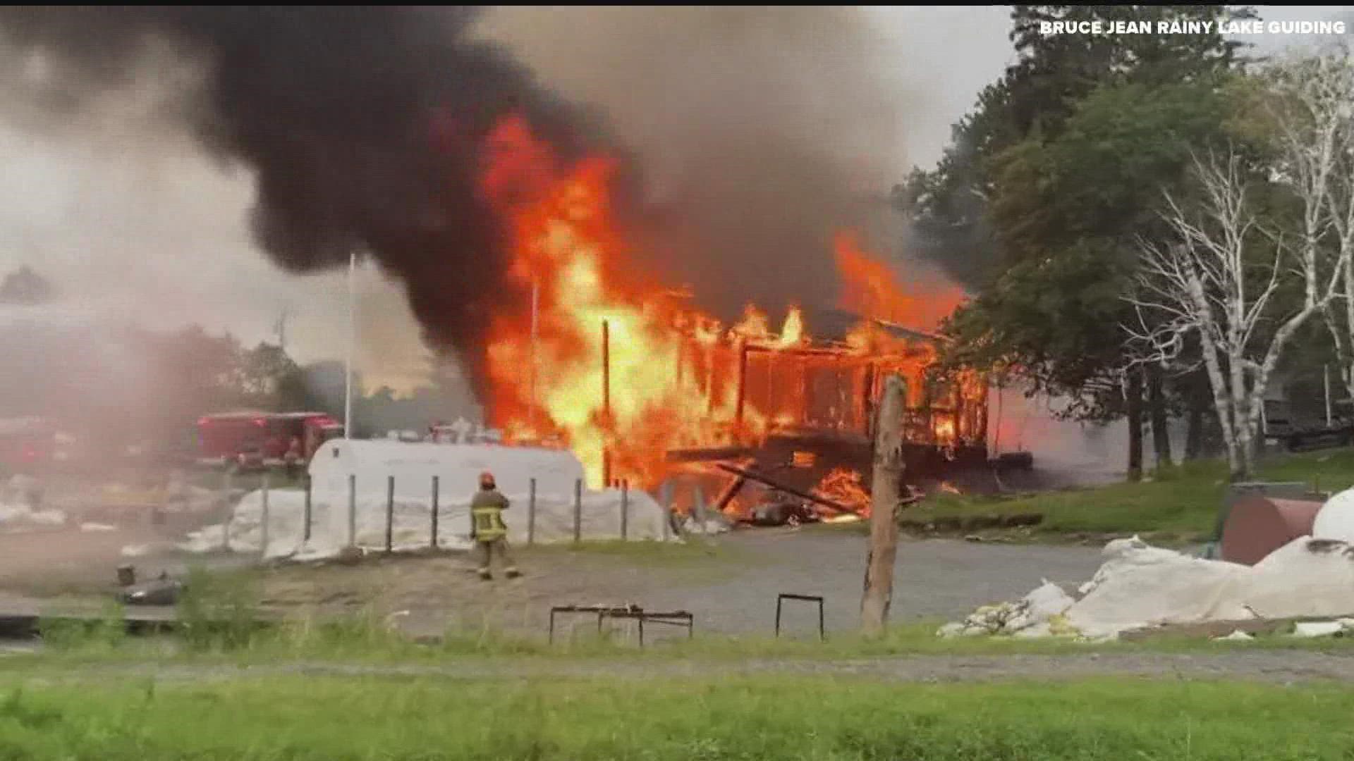 A fire at a houseboat business on Rainy Lake sent two people to the hospital on Wednesday.
