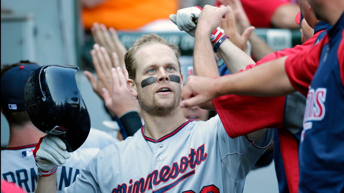 Excited Justin Morneau takes the field in his low-key Twins return
