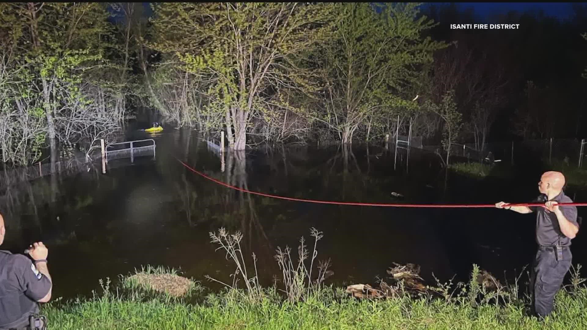 A kayaker was rescued from the Rum River Tuesday night after a nearby neighbor leapt into action.