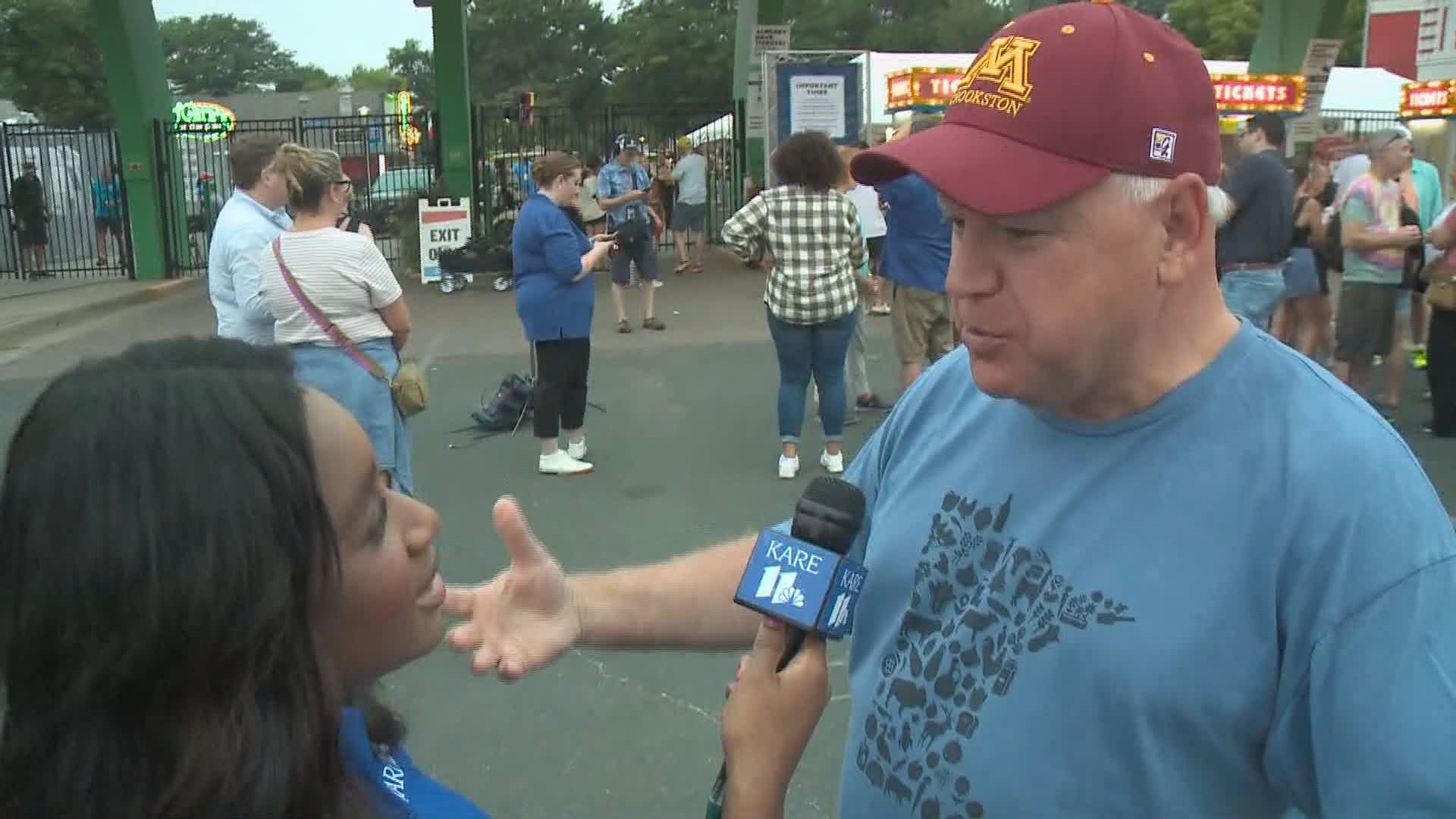 Gov. Tim Walz was among a throng chomping at the bit to get through the gates Thursday as the 2023 Minnesota State Fair opened its 12-day run.