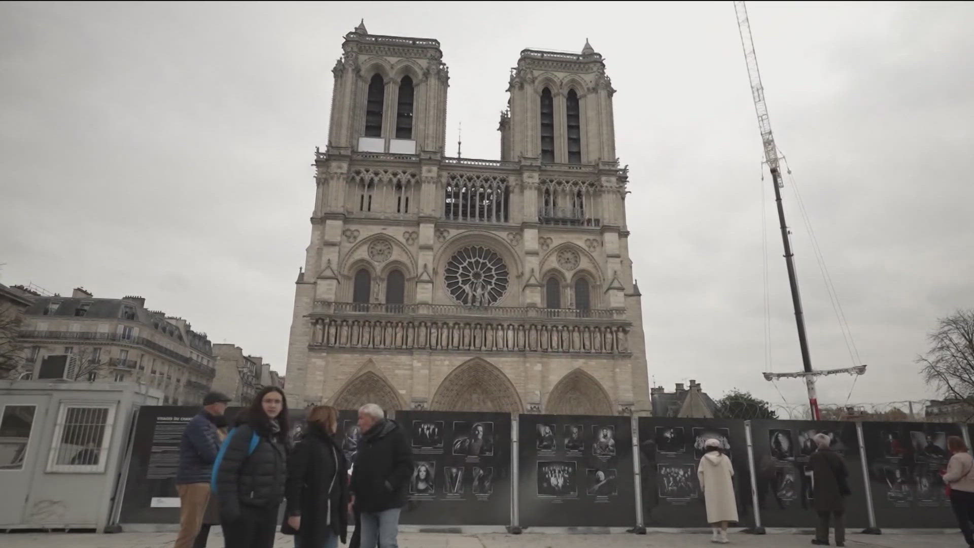 The fire engulfed the cathedral's famous spire and almost toppled the main bell towers.