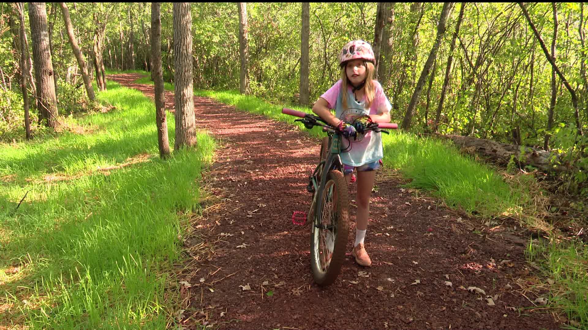 Fifth-grade teacher Lori Vosacek said many of her students haven't experienced the mountain biking trails in their hometown, but that's starting to change.