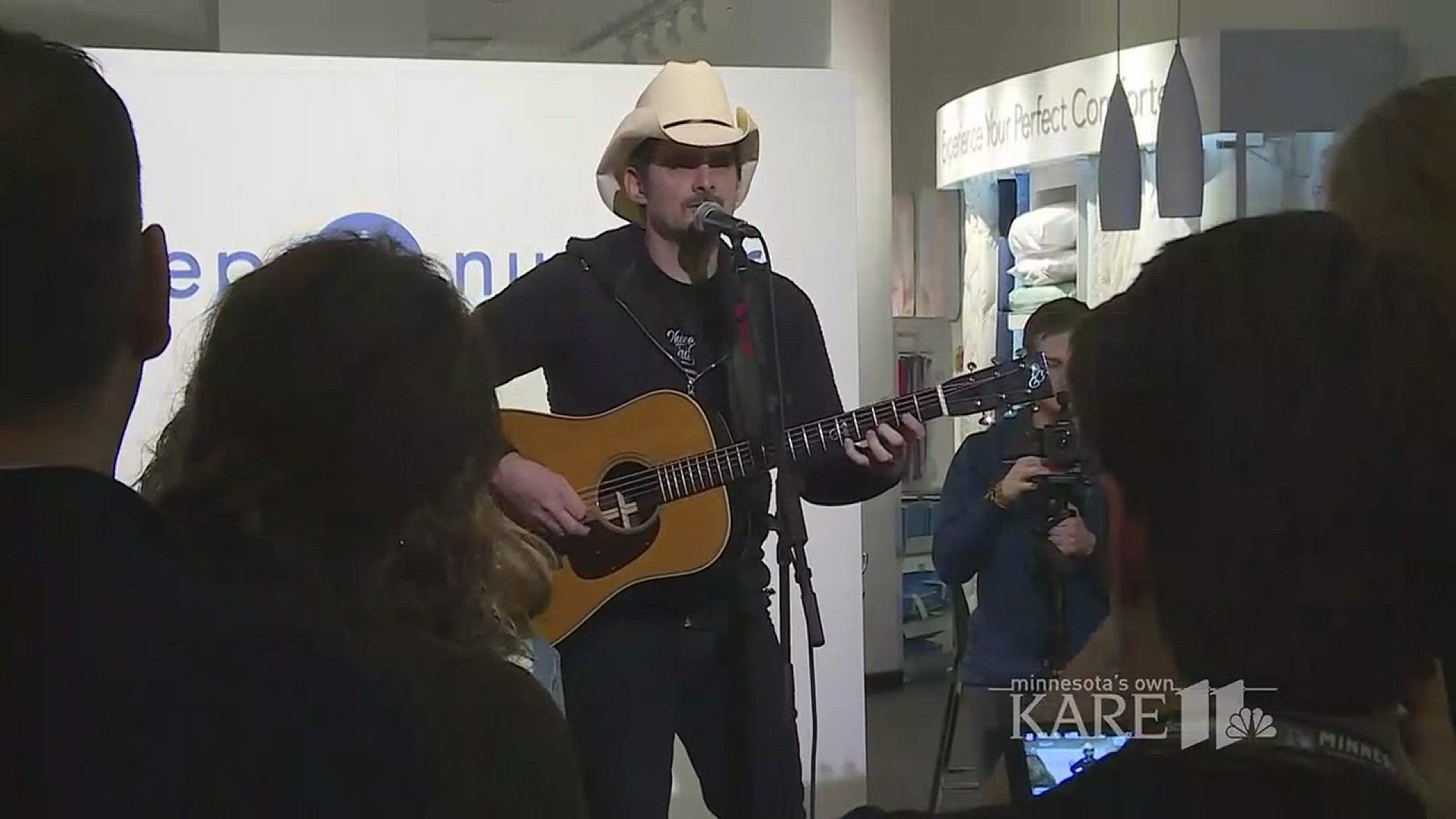 Brad Paisley surprised fans with a pop-up show at the Sleep Number store at the Mall of America on Tuesday. http://kare11.tv/2Ese7Ie