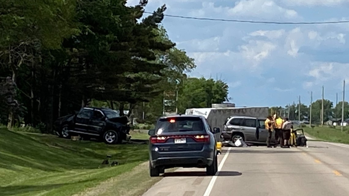 Woman injured, 2 men dead in New Richmond crash