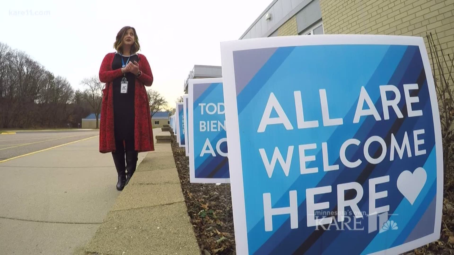 The story behind the 'All Are Welcome Here' signs