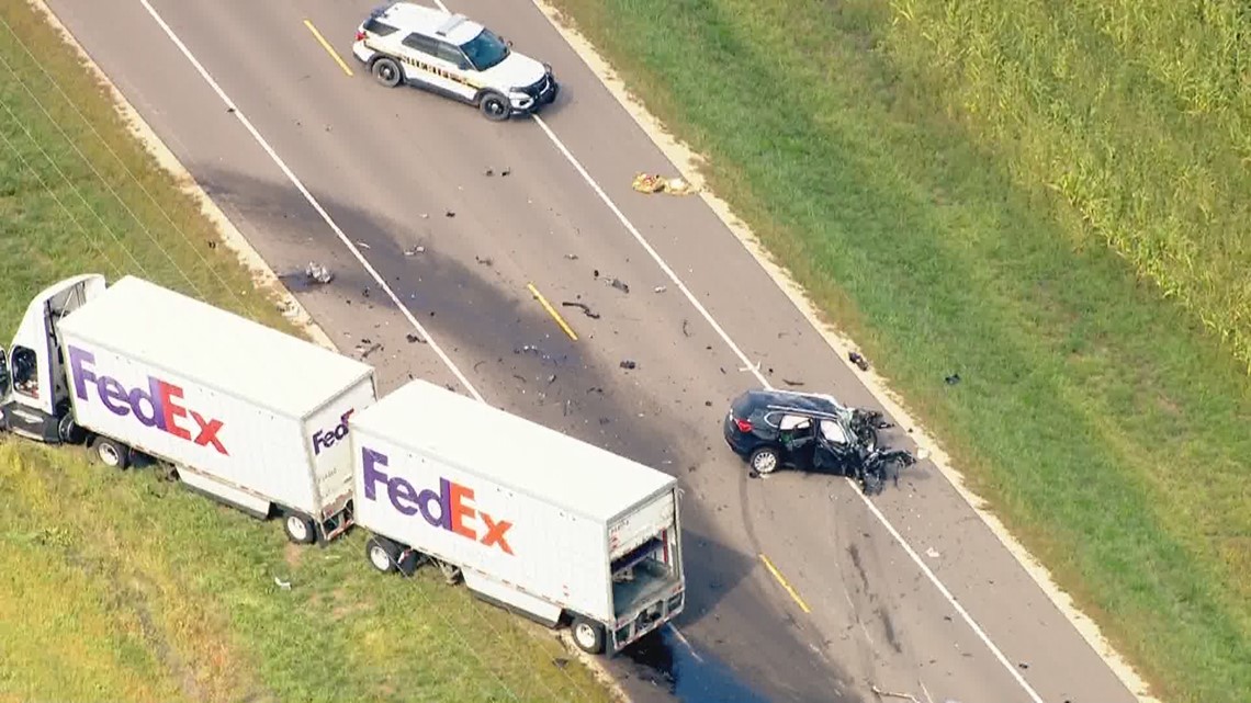 At least 1 dead after crash involving FedEx semitruck