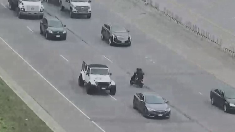 Slow-speed scooter chase down busy interstate ends with arrest
