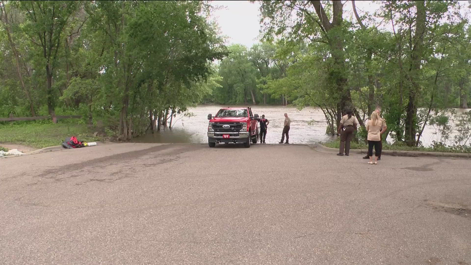 A vehicle was spotted driving into the river on Sunday night but crews were not able to pull it out because of the strong currents.