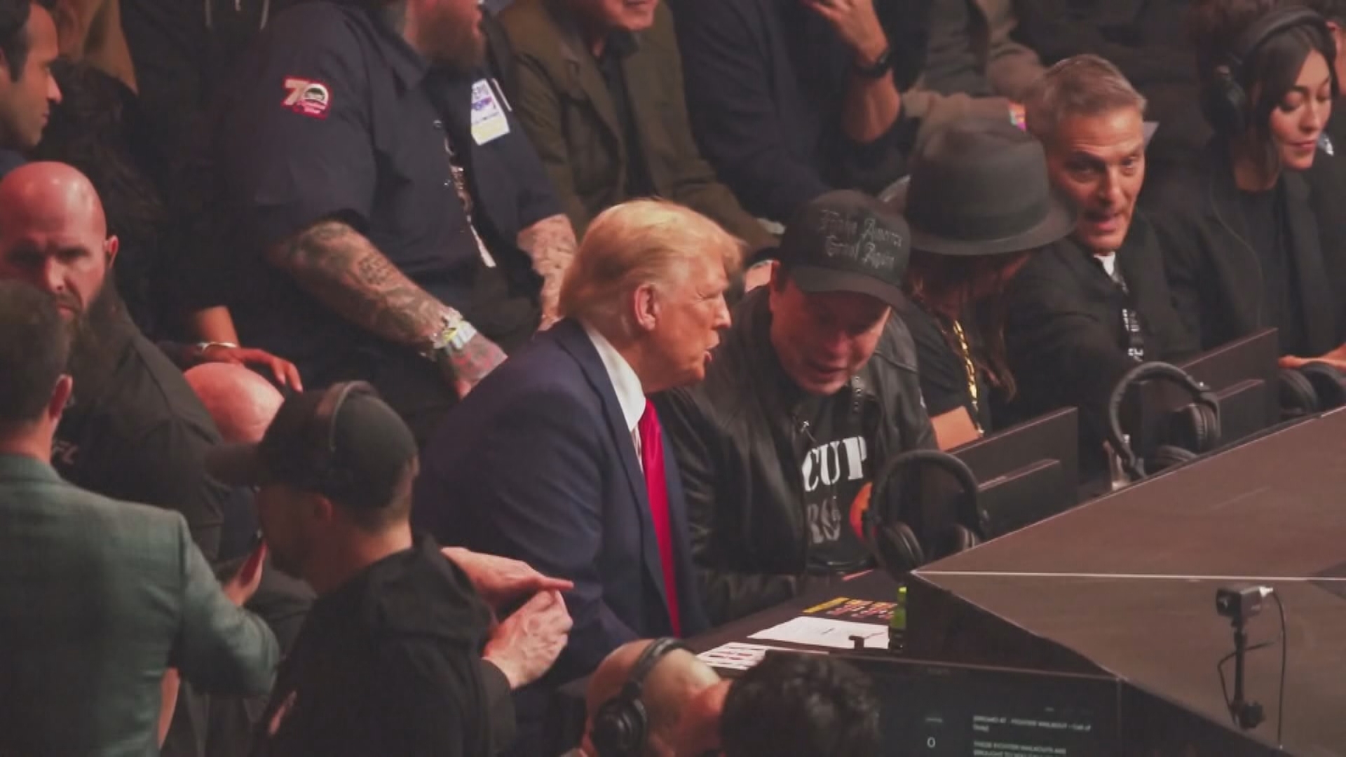 Trump appeared at a UFC event flanked by potential members of his administration. He prepares to battle for his controversial picks to head the DOJ, DOD and HHS.