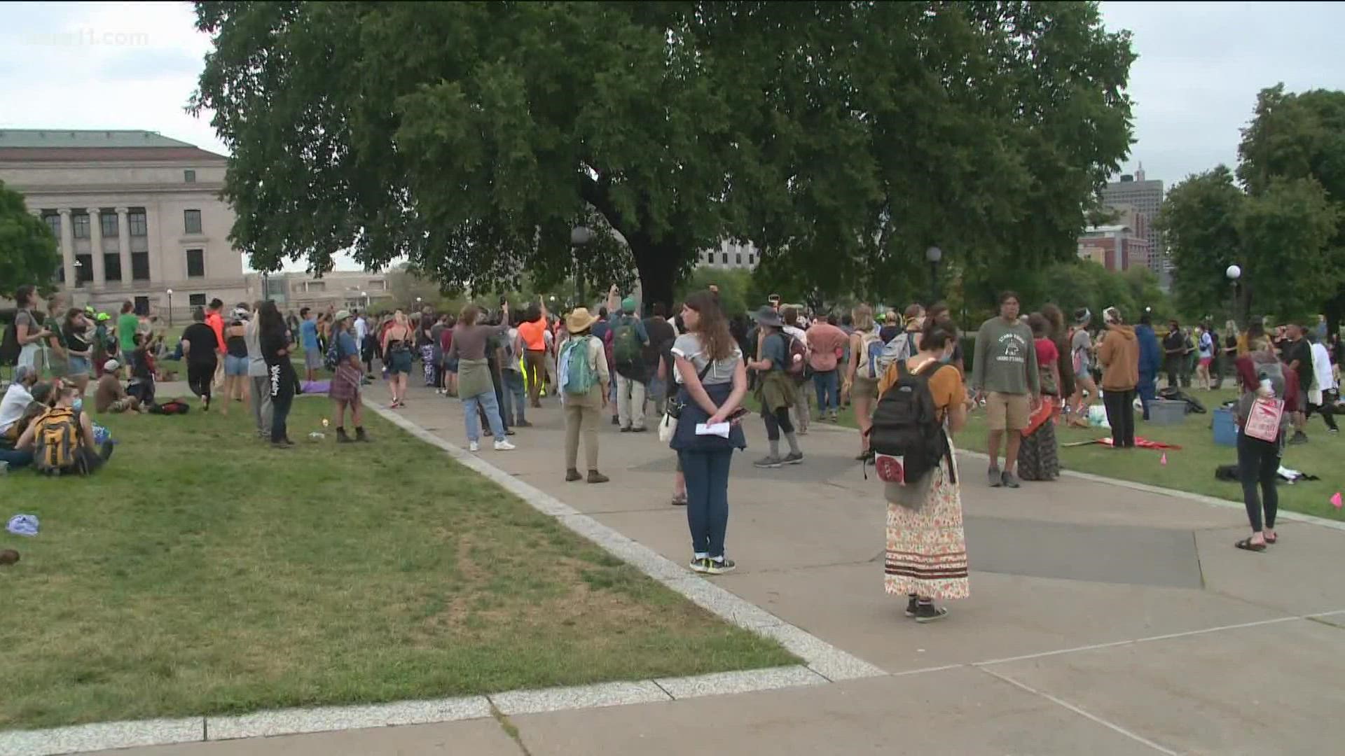 State Troopers surrounded protestors on the Capitol grounds early Friday afternoon, citing an expired permit.