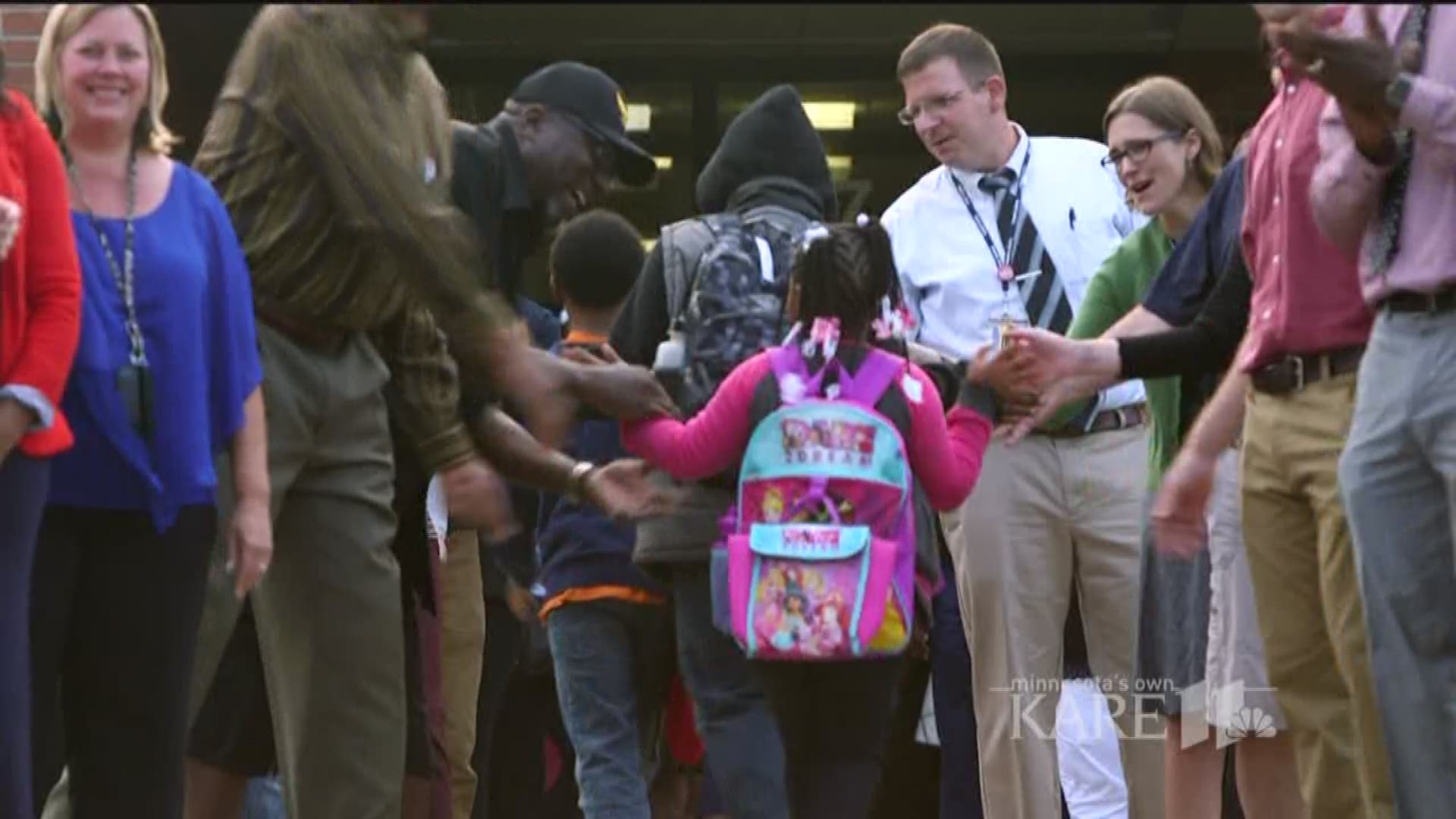 Photojournalist Ben Garvin takes us to the first day of school at Lucy Craft Laney Community School, which looks a lot like a big celebration. http://kare11.tv/2vjDWsU