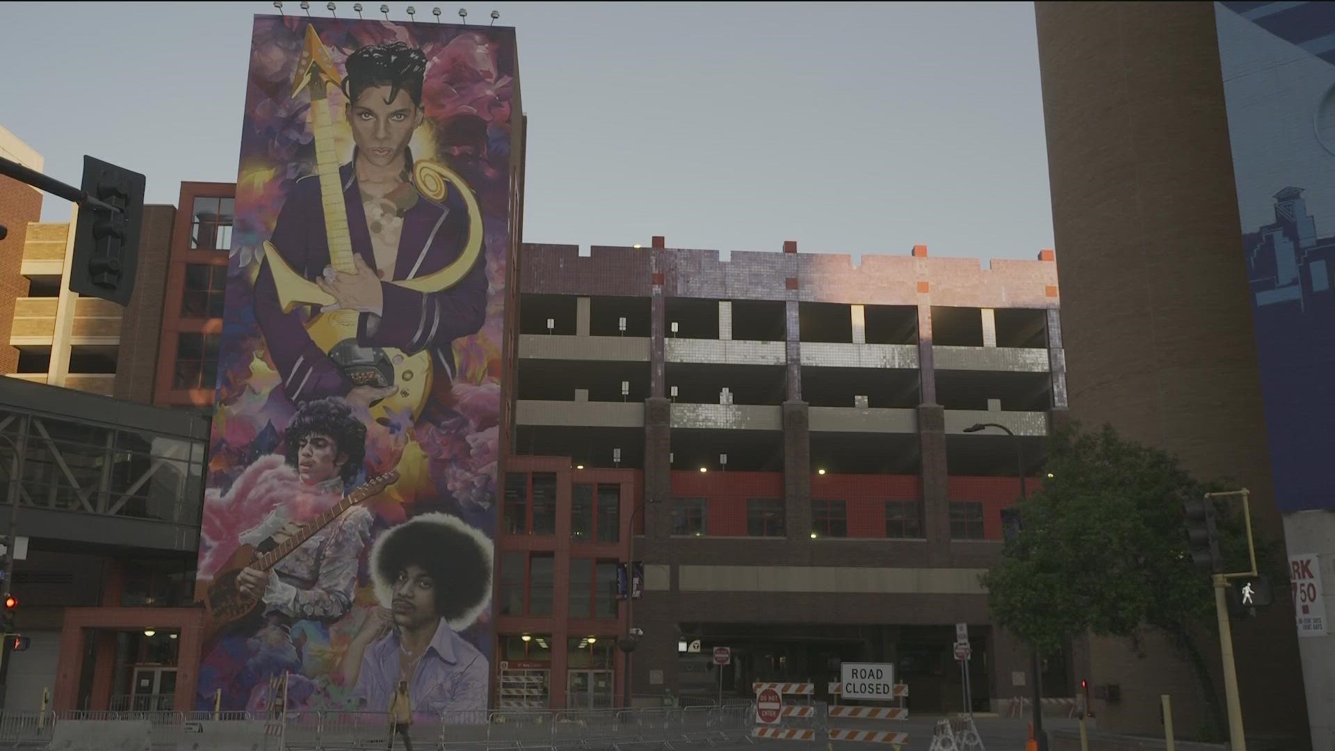 Painted by muralist Hiero Veiga, the tribute to Prince stands 100 feet tall and is located downtown Minneapolis at First Avenue and 8th Street.