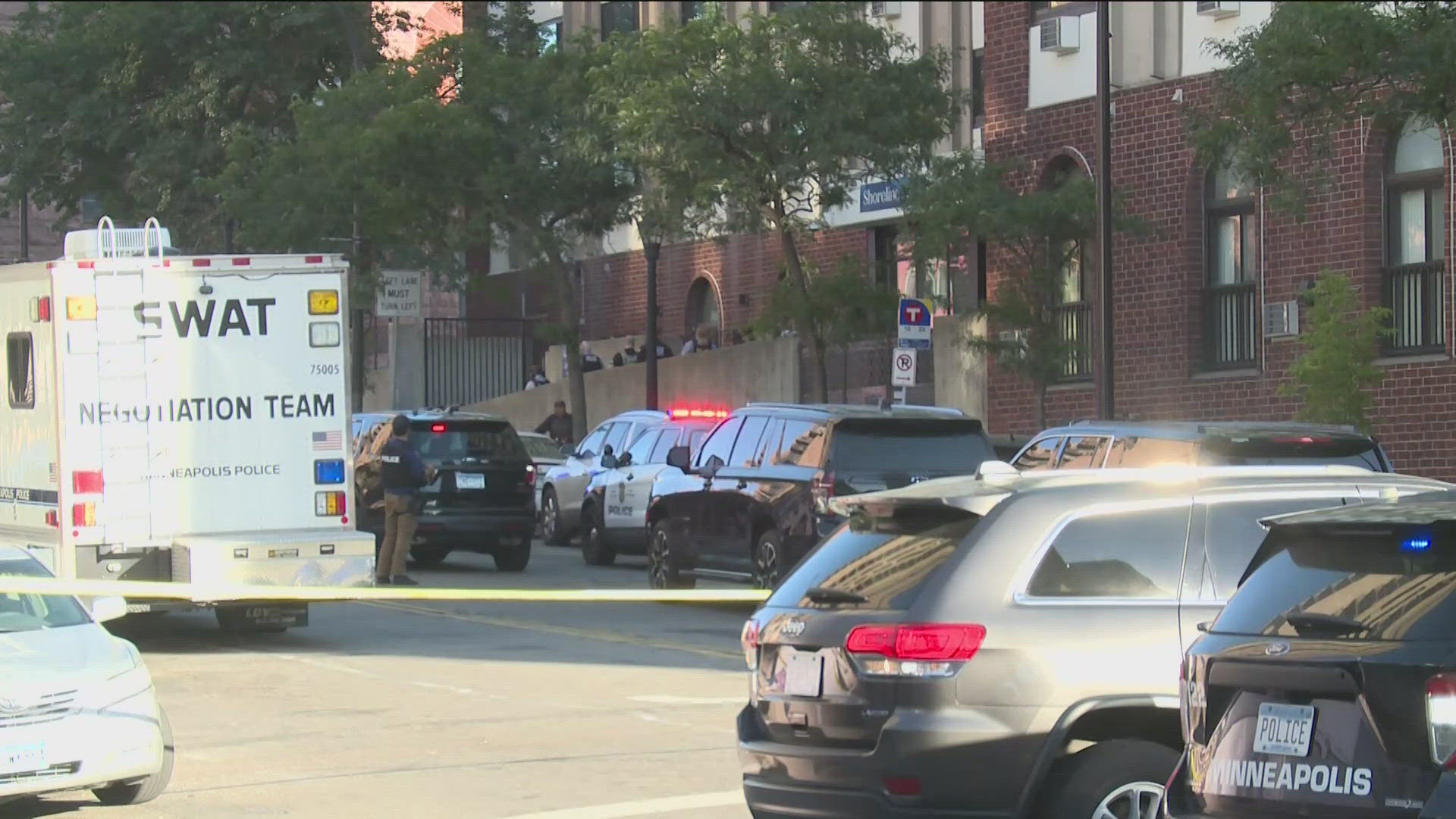 While police say they haven't yet found a gun, multiple 911 callers reported hearing shots fired in an apartment building downtown.