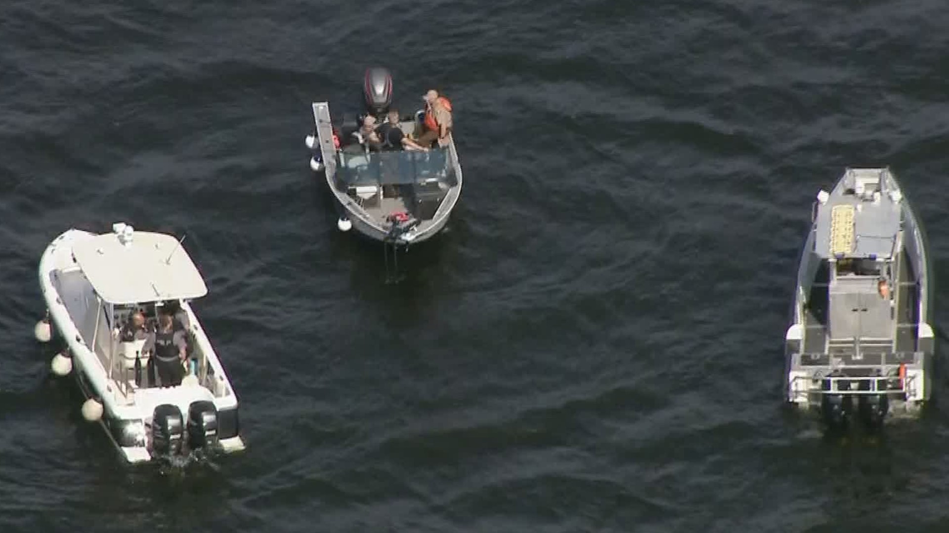 Crews are searching after a boater reported seeing an empty boat circling and a body in the St. Croix River.