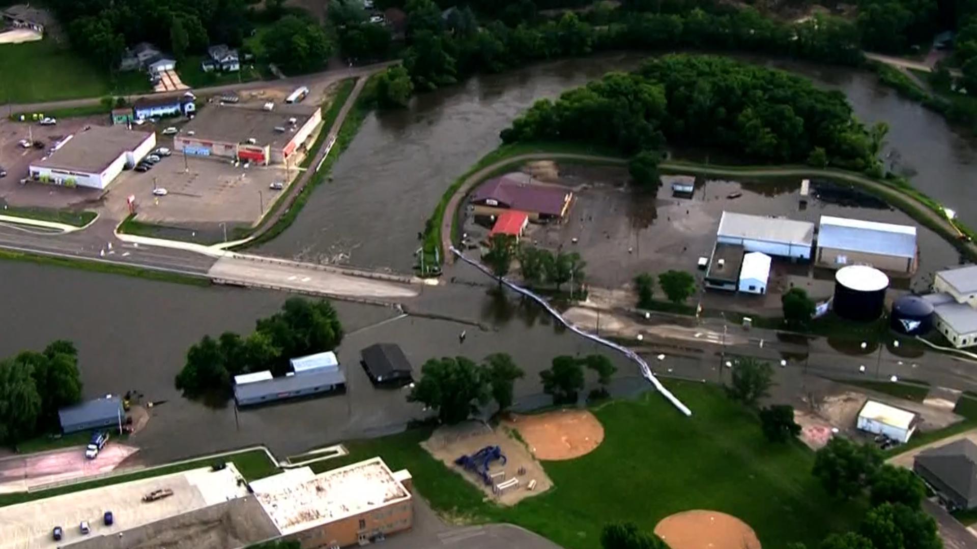 See the flooding in southwestern Minnesota on Tuesday morning as residents navigate the overflowing West Fork of the Des Moines River.